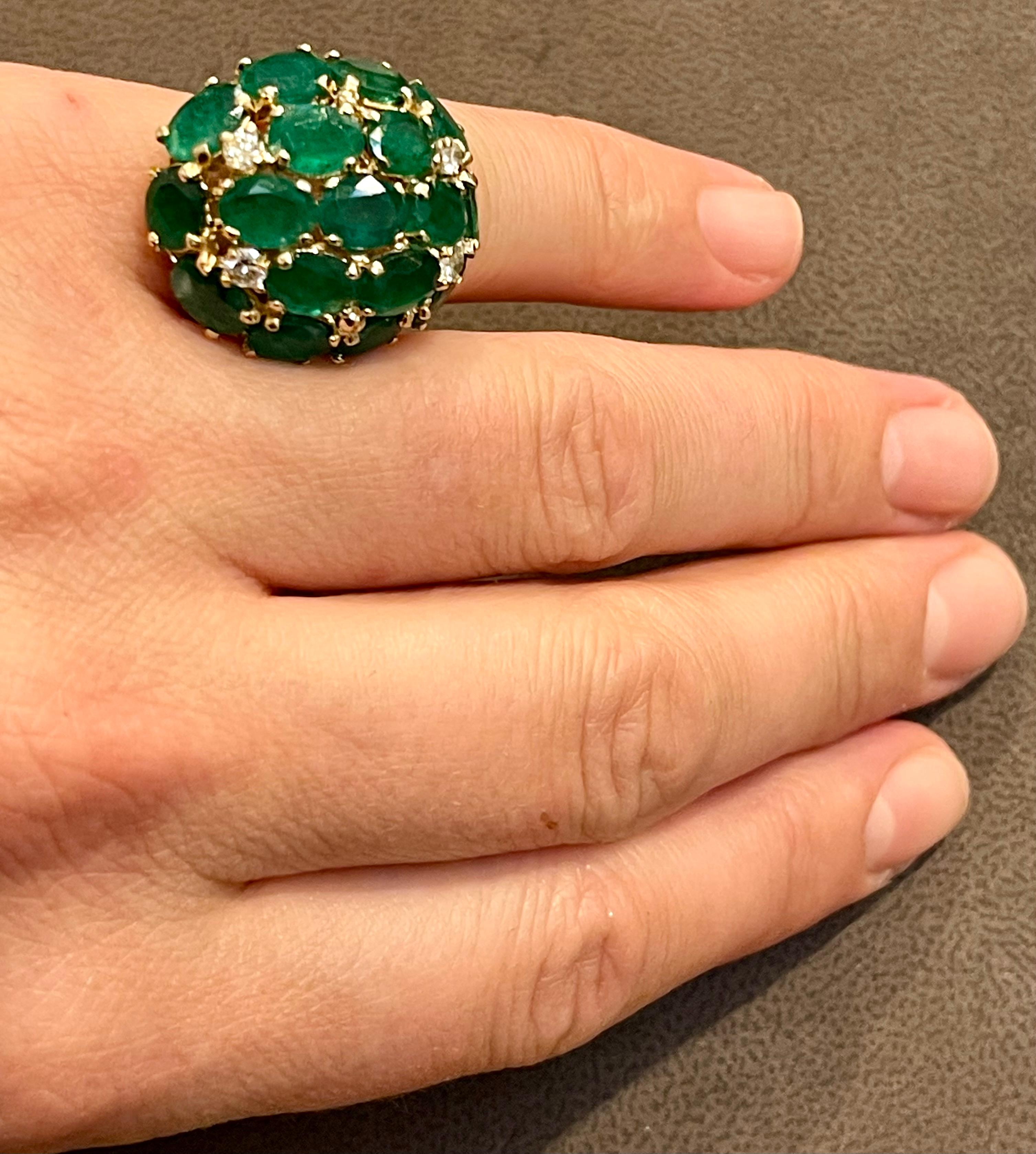 Amazing Cocktail ring, eye catching 
Approximately 12.5  Ct Natural Brazilian  Emerald 17 Stone  , 
 14 Karat Yellow  Gold Ring  Size 4
Oval Shape  Emerald Ring 
 There are 12 Natural  fine quality  Oval shape emerald stones , all perfectly matching