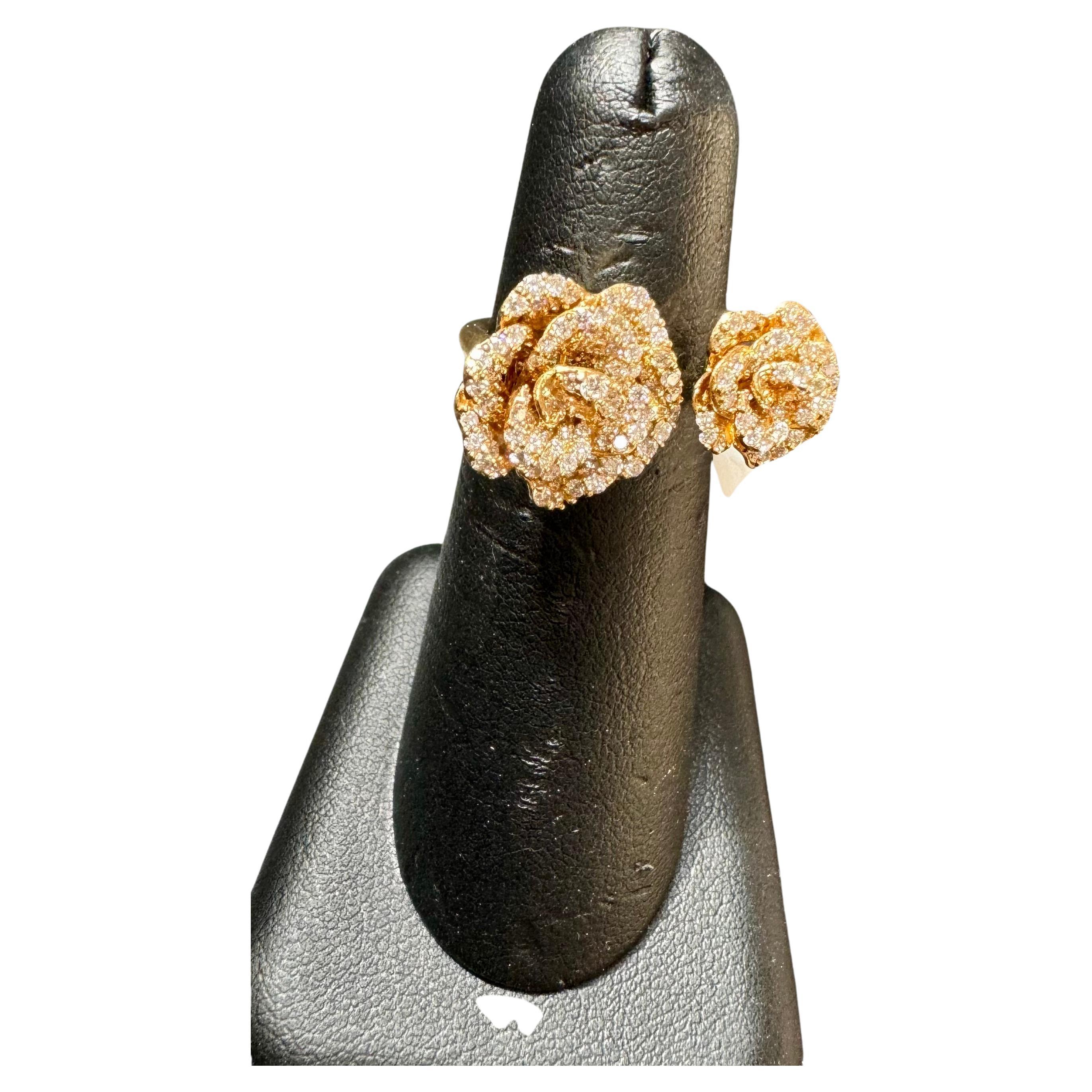 
1.25 Ct Natural  Diamond Two Flower Bypass Cocktail Ring in Size 6 in 18 Karat Yellow  Gold

A Classic Beauty. This 18 Karat Yellow gold ring  features two flowers , one big , one small of  brilliant cut round shape diamonds 

Diamond Clarity: VS