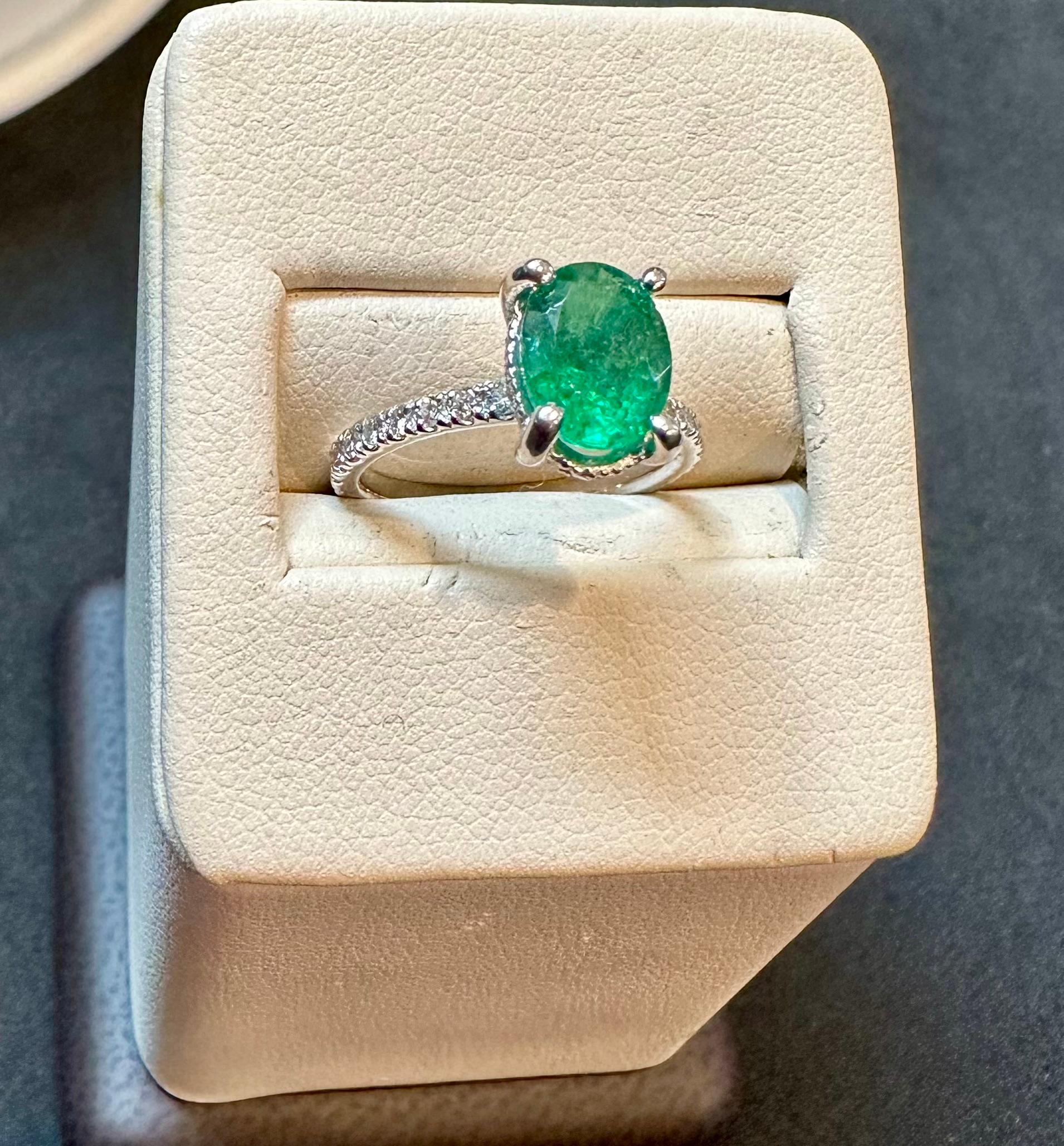 Natural 1.25 Ct Oval Cut Natural Emerald & 0.85 Ct Natural Pave Diamond Hidden Halo Engagement Ring with size 3.75 in 14 K white Gold
Introducing a truly stunning piece, behold the 1.25 Carat Oval Natural Zambian Emerald & 0.85ct Diamond Ring in