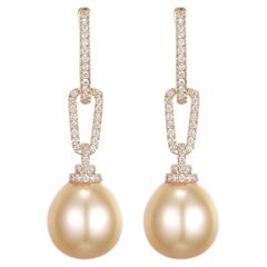 12.5 x 15mm Oval South Sea Pearl Diamond Dangle Earrings in 14 Karat Yellow Gold