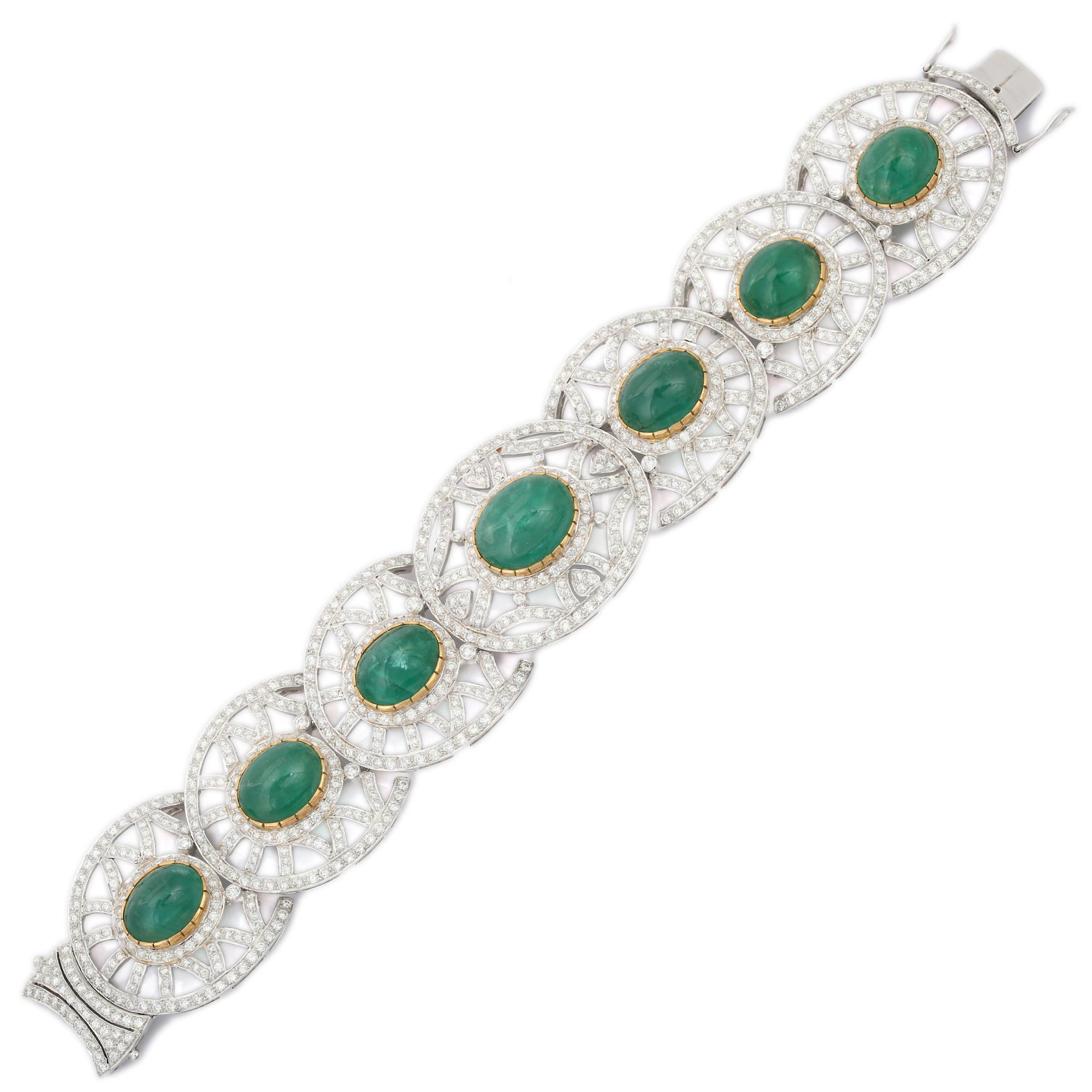 This Statement Jewelry Emerald Diamond Fine Bracelet in 18K gold showcases 7 endlessly sparkling cabochon emerald, weighing 53 carat and  diamonds weighing 12.5 carat. It measures 7.5 inches long in length. 
Emerald enhances the intellectual