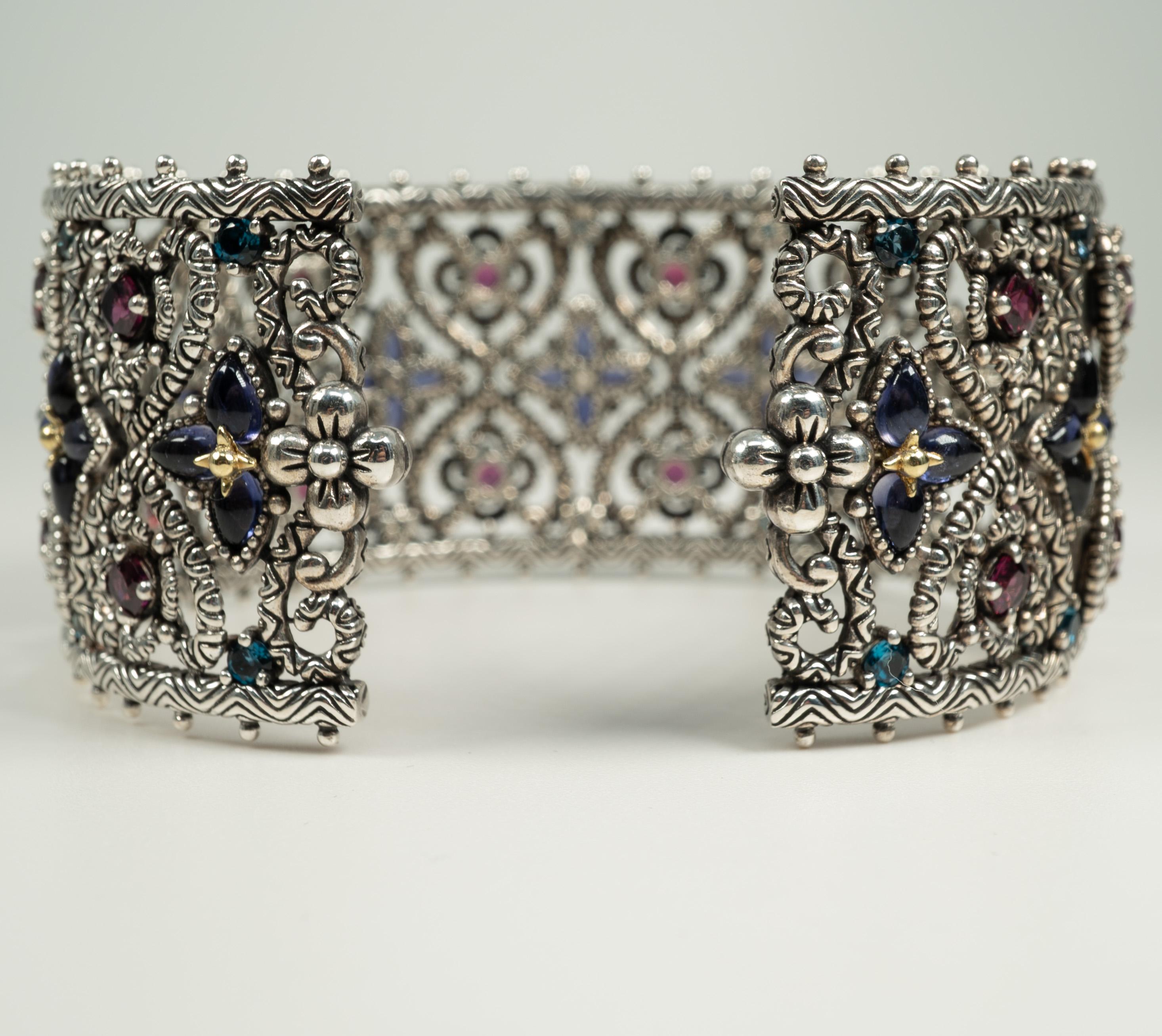Dieses atemberaubende Armband aus Sterlingsilber und Gelbgold mit 12,50 Karat Edelsteinen und einem Verschluss aus Edelstahl ist perfekt für jedes Handgelenk!