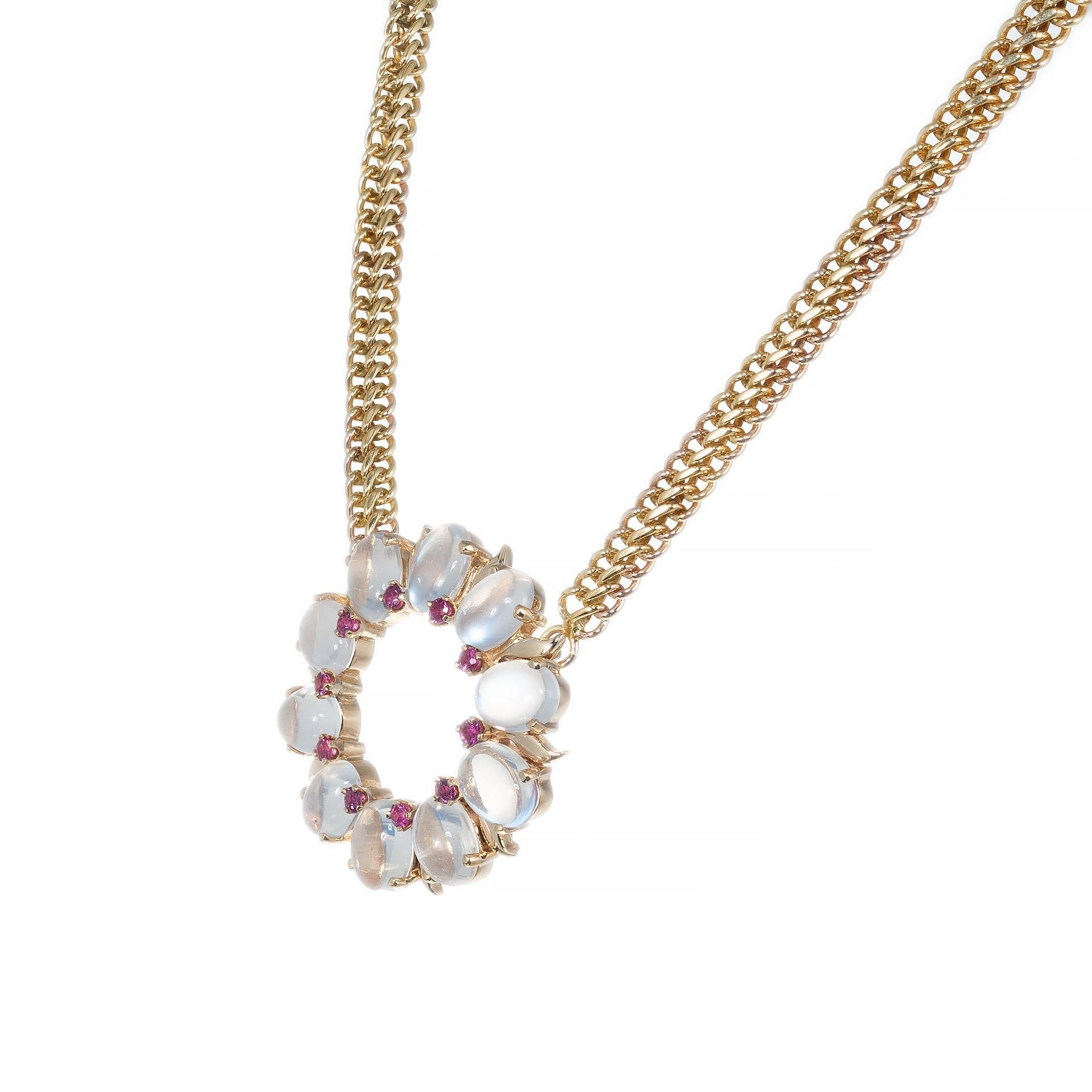 Mid-century swirl design Moonstone and Ruby rose gold pendant necklace. 10 oval moonstones with 10 round accent diamonds set in 14k yellow gold, with a 17 inch chain.  

10 8 x 6mm fine translucent blue Moonstones, approx. total weight 12.0cts,