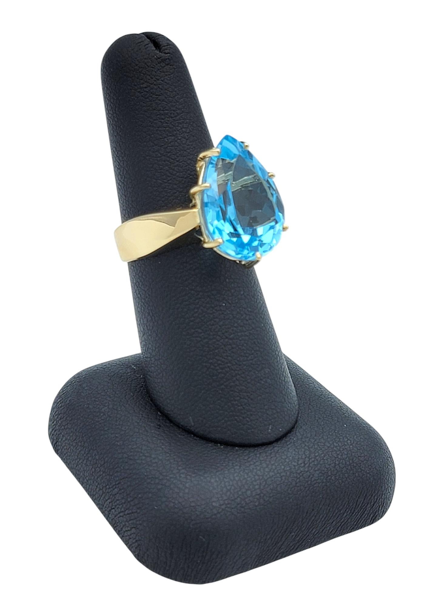 12.50 Carat Pear Cut Blue Topaz Solitaire Wide Band Ring in 14 Karat Yellow Gold For Sale 5
