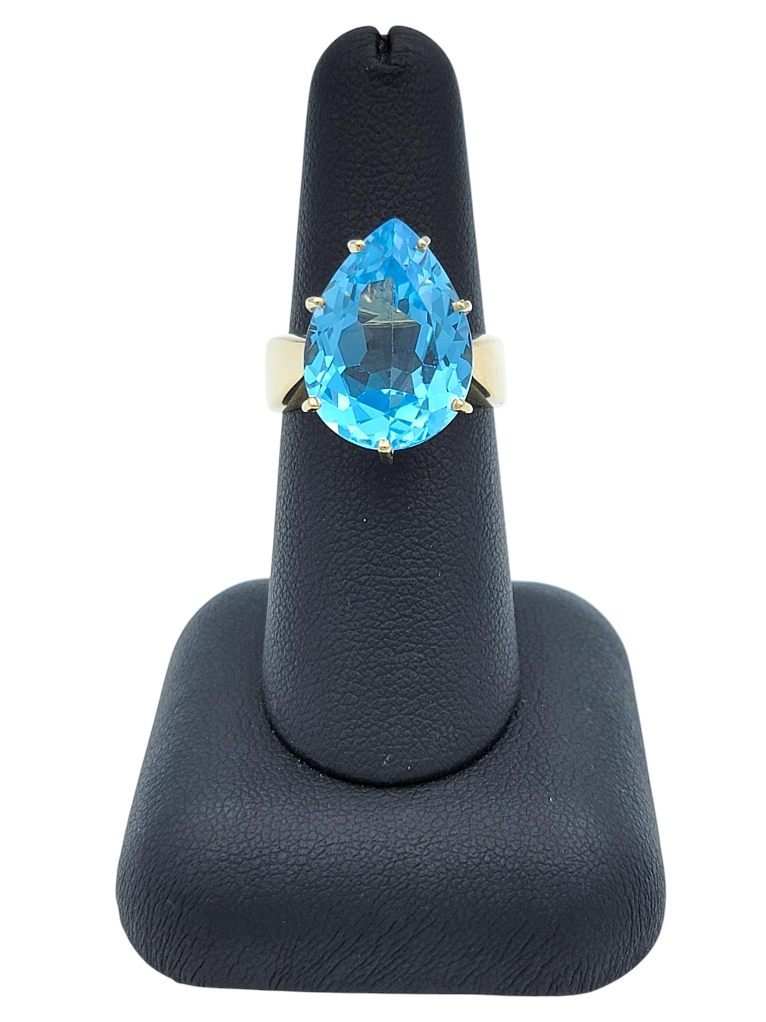 12.50 Carat Pear Cut Blue Topaz Solitaire Wide Band Ring in 14 Karat Yellow Gold For Sale 4