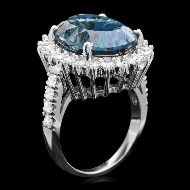 12.50 Carats Natural Blue Topaz and Diamond 14K Solid White Gold Ring

Total Natural Blue Topaz Weight is: Approx. 11.00 Carats 

Blue Topaz Measures: Approx. 16.00 x 12.00mm

Natural Round Diamonds Weight: Approx. 1.50 Carats (color G-H / Clarity