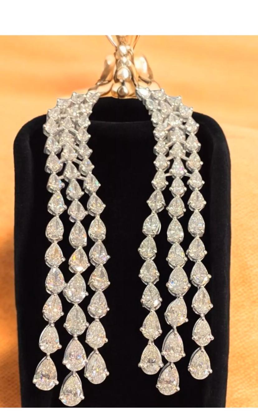 Pear Cut IGI 12.50 Carats Pear Shape Diamonds 18K Gold Earrings For Sale