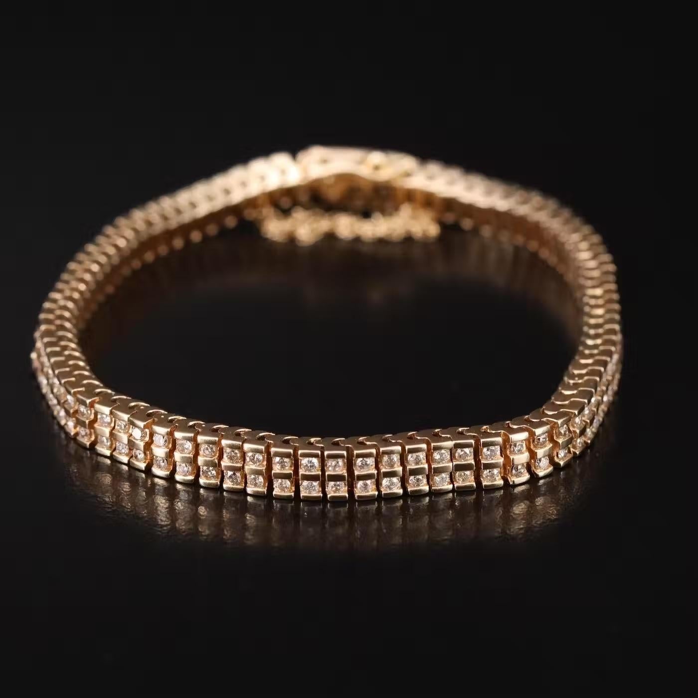 Designer Double Raw Line Bracelet, HALLMARKS: BV  

Absolute luxury

New with tags,  retail price on Tags $12500

2 CWT sparkly natural Diamond

14K gold, weight is 18.4 grams 

The bracelet length is 6.75 inches

It comes with a safety chain 