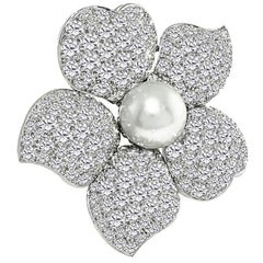 Spilla a fiore con diamante e perla da 12,50 ct