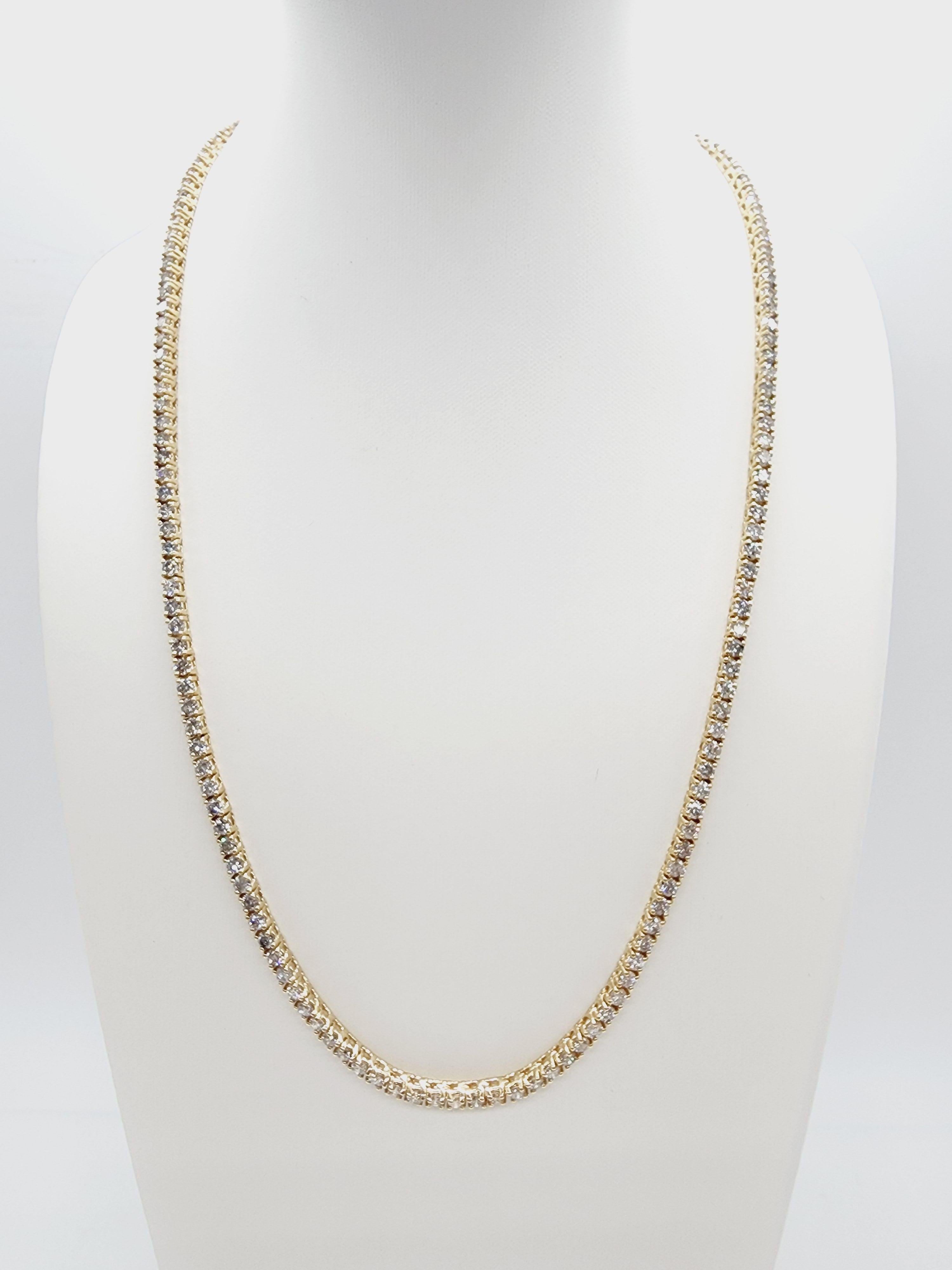 Beautiful tennis necklace, round-brilliant cut white diamonds and Excellent shine. 
14k yellow gold classic four-prong style for maximum light brilliance. 
18 inch length Average Color G, Clarity I, 3.1 mm wide.

*Free shipping within the US