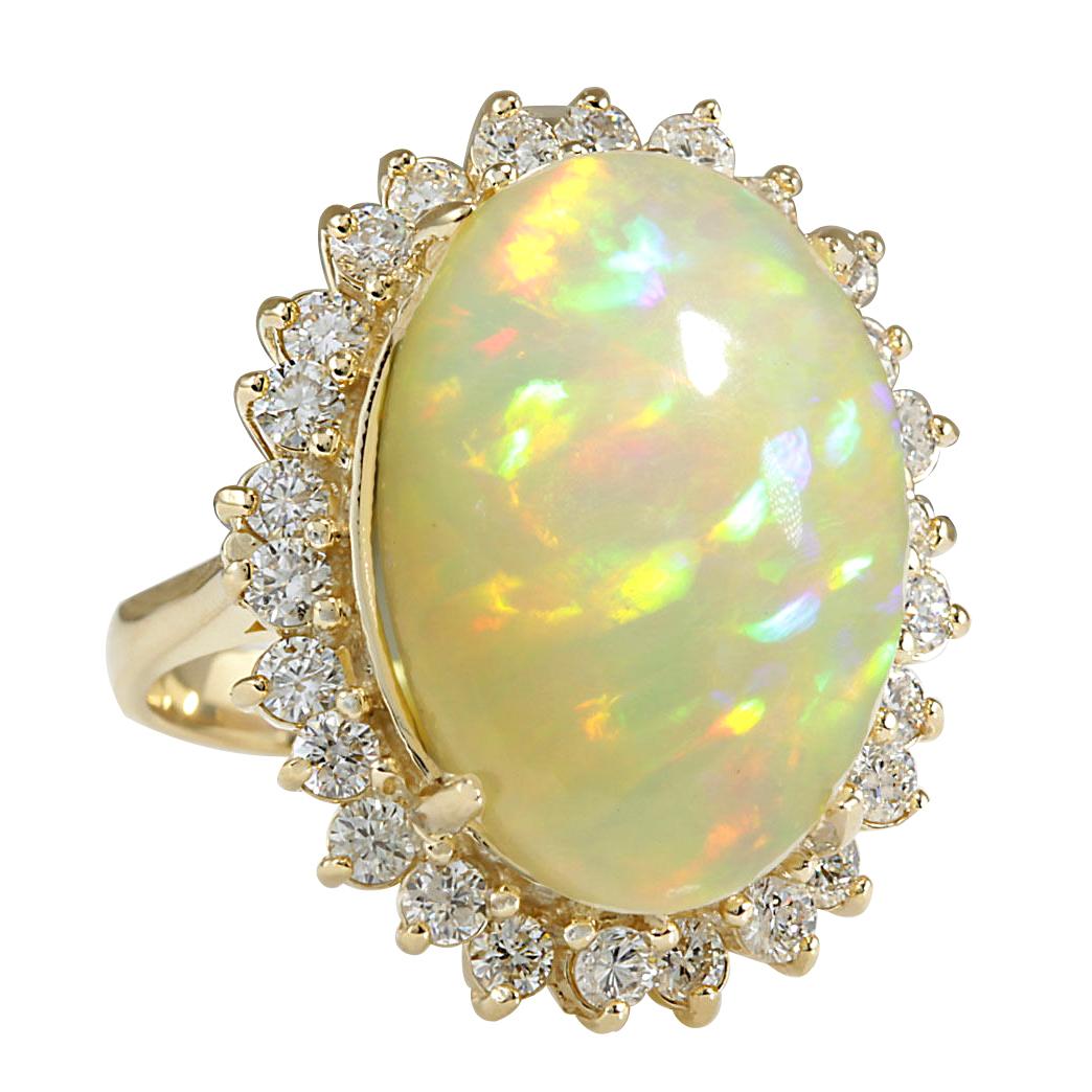 Stamped: 14K Yellow Gold
Total Ring Weight: 9.2 Grams
Total Natural Opal Weight is 11.28 Carat (Measures: 18.00x13.00 mm)
Color: Multicolor
Total Natural Diamond Weight is 1.23 Carat
Color: F-G, Clarity: VS2-SI1
Face Measures: 25.30x20.45 mm
Sku: