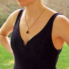 12.52 Carat Pear Shaped Red Garnet Pendant Set in 9 Karat Yellow Gold