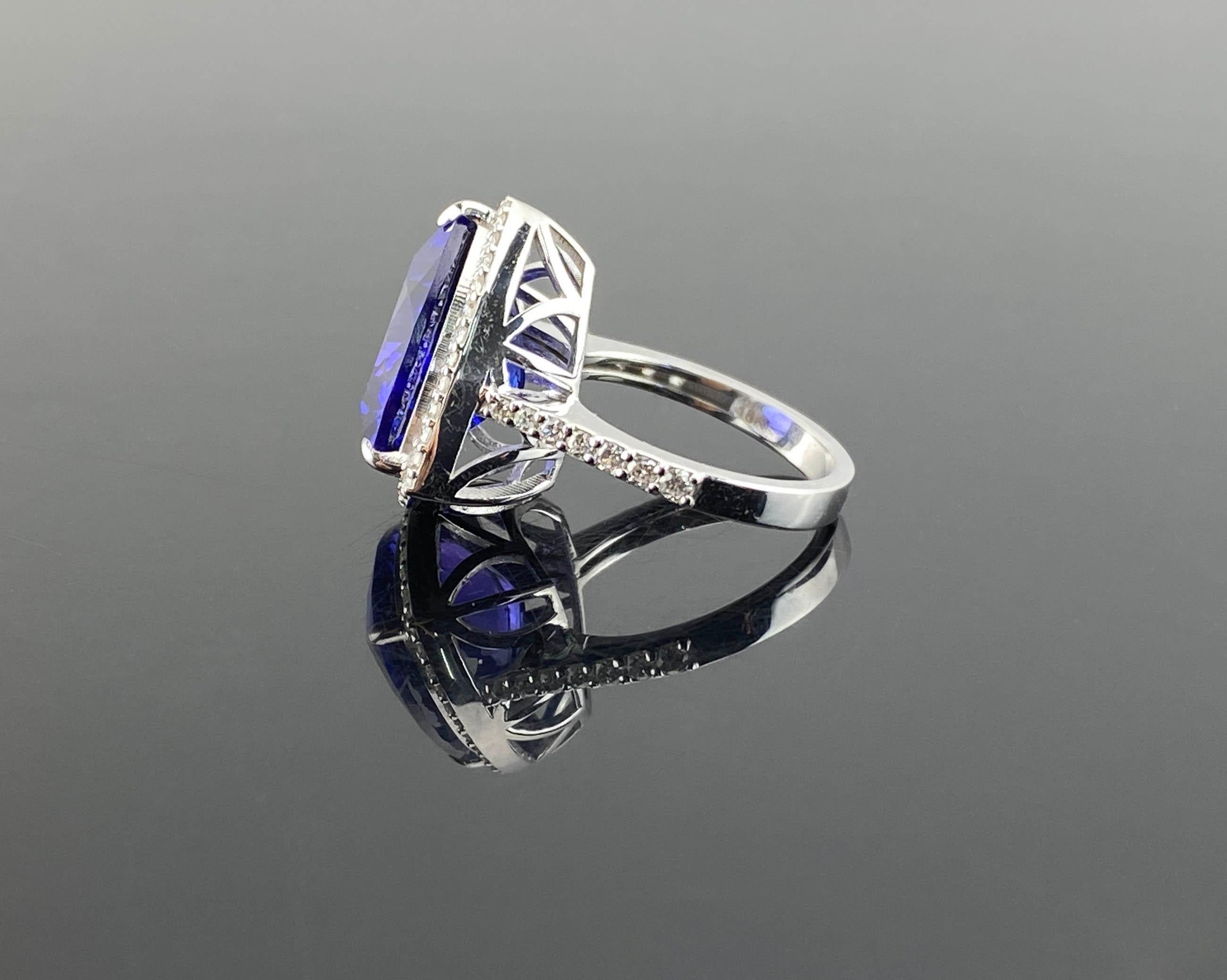 Women's 12.54 Carat Trillion Cut Tanzanite and Diamond Cocktail Ring Set in White Gold For Sale