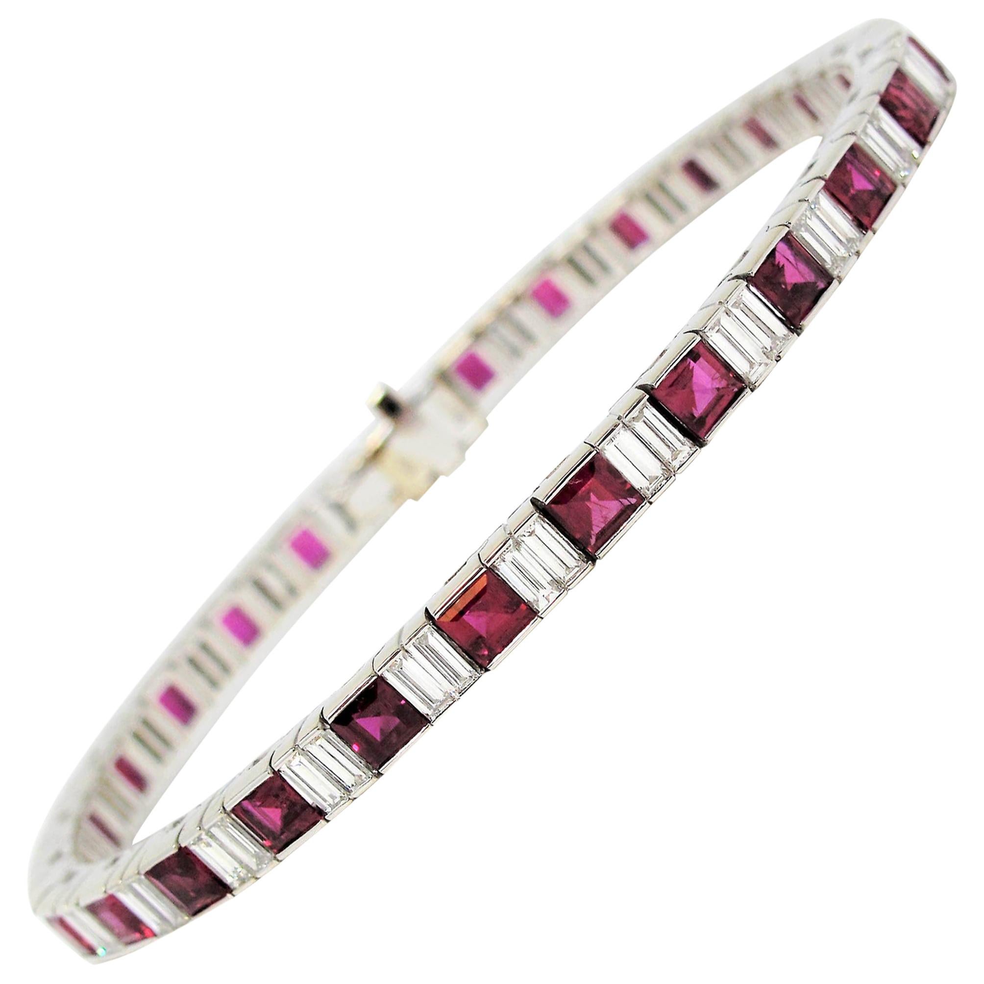 Stunning, elegant tennis bracelet with a bright pop of color. This gorgeous piece absolutely dazzles with its rich red rubies and bright white diamonds. The sleek, linear design paired with the contemporary squared shape of the gemstones, takes this