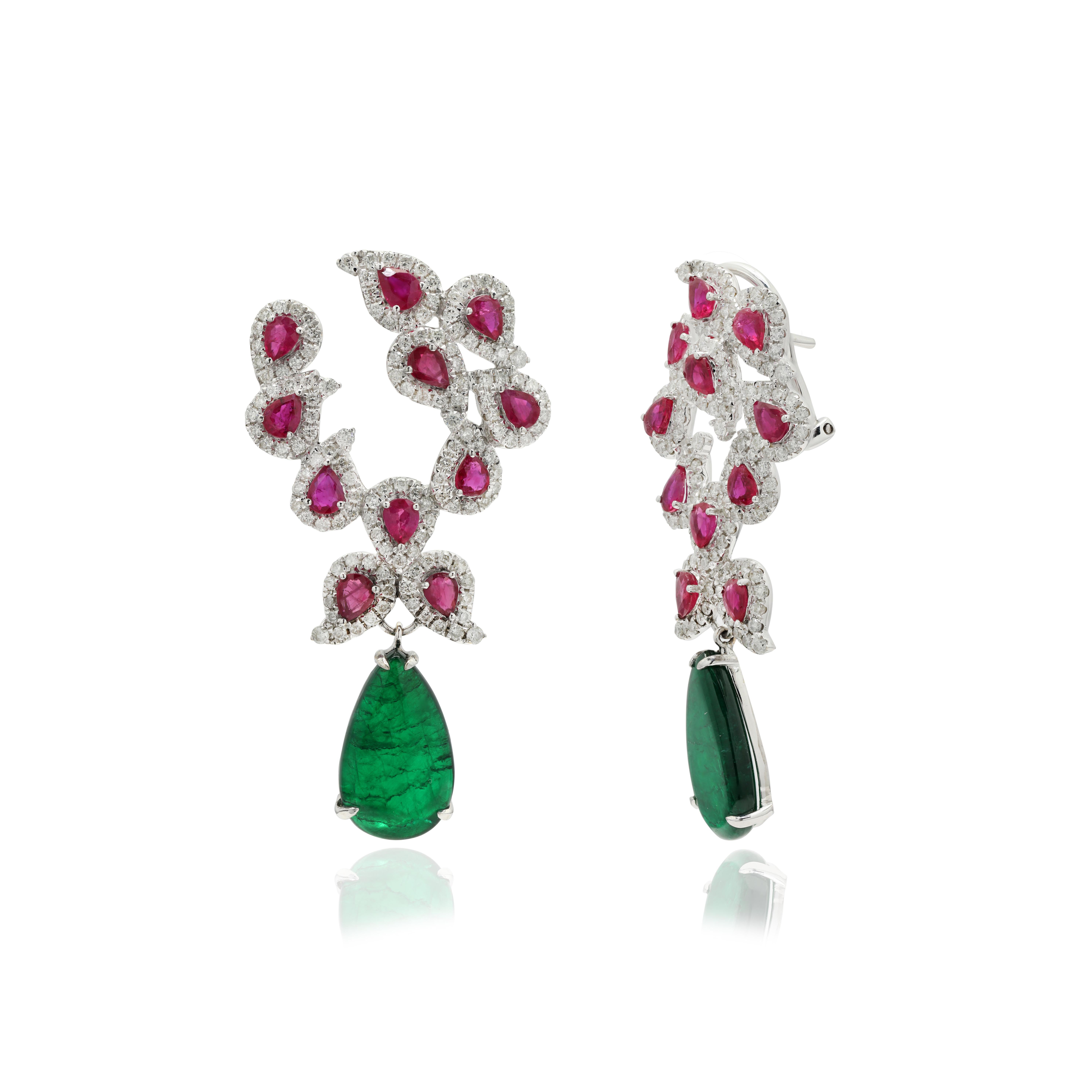 Ruby and Emerald Dangle earrings to make a statement with your look. These earrings create a sparkling, luxurious look featuring pear cut gemstone.
If you love to gravitate towards unique styles, this piece of jewelry is perfect for you.

PRODUCT