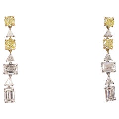 12.56 Cts Fancy Yellow and White Diamond Earrings in 18K Gold