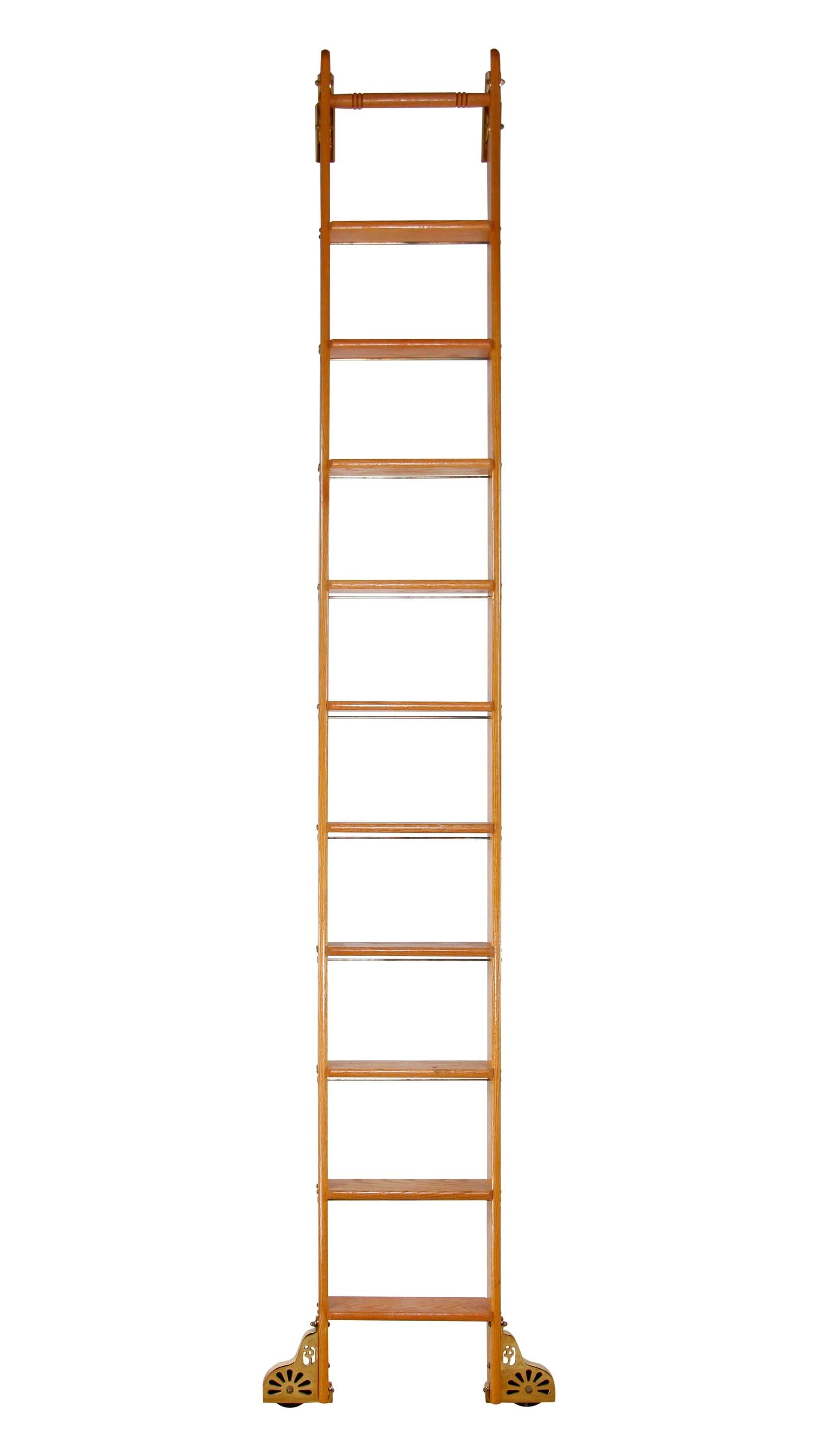 Mid-20th century oak library ladder in a light stain. Original Putnam Rolling Ladder Co, Inc. sticker, Features brass plated steel hardware and side rolling bottom wheels. No top wheels. Made by Putnam Rolling Ladder Co., Inc. Please note, this item