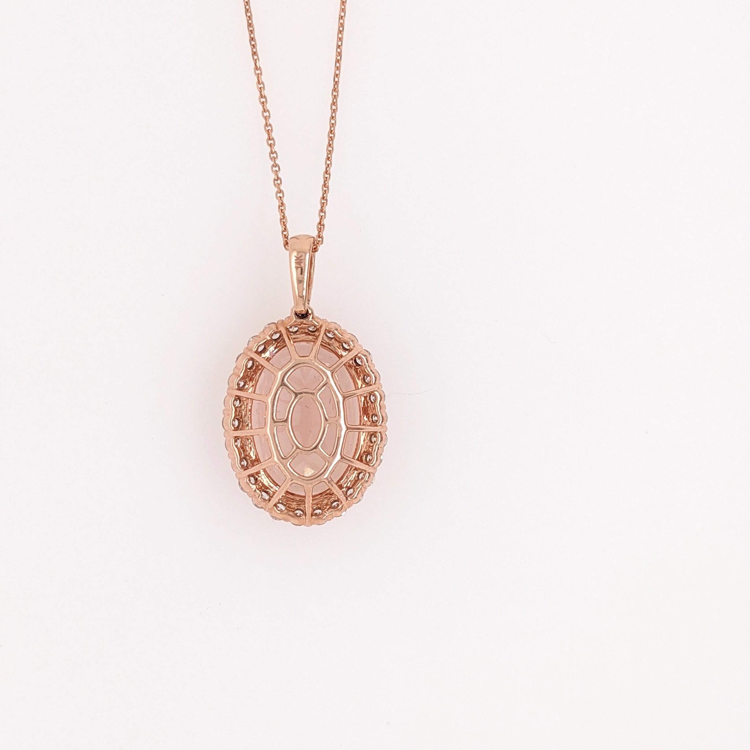 This huge 12.58 carat Morganite looks stunning in this pendant with a classic halo design and a diamond studded bail. 14k rose gold makes this piece extra unique and extra pink! The prong setting shows off this beautiful oval morganite ensuring