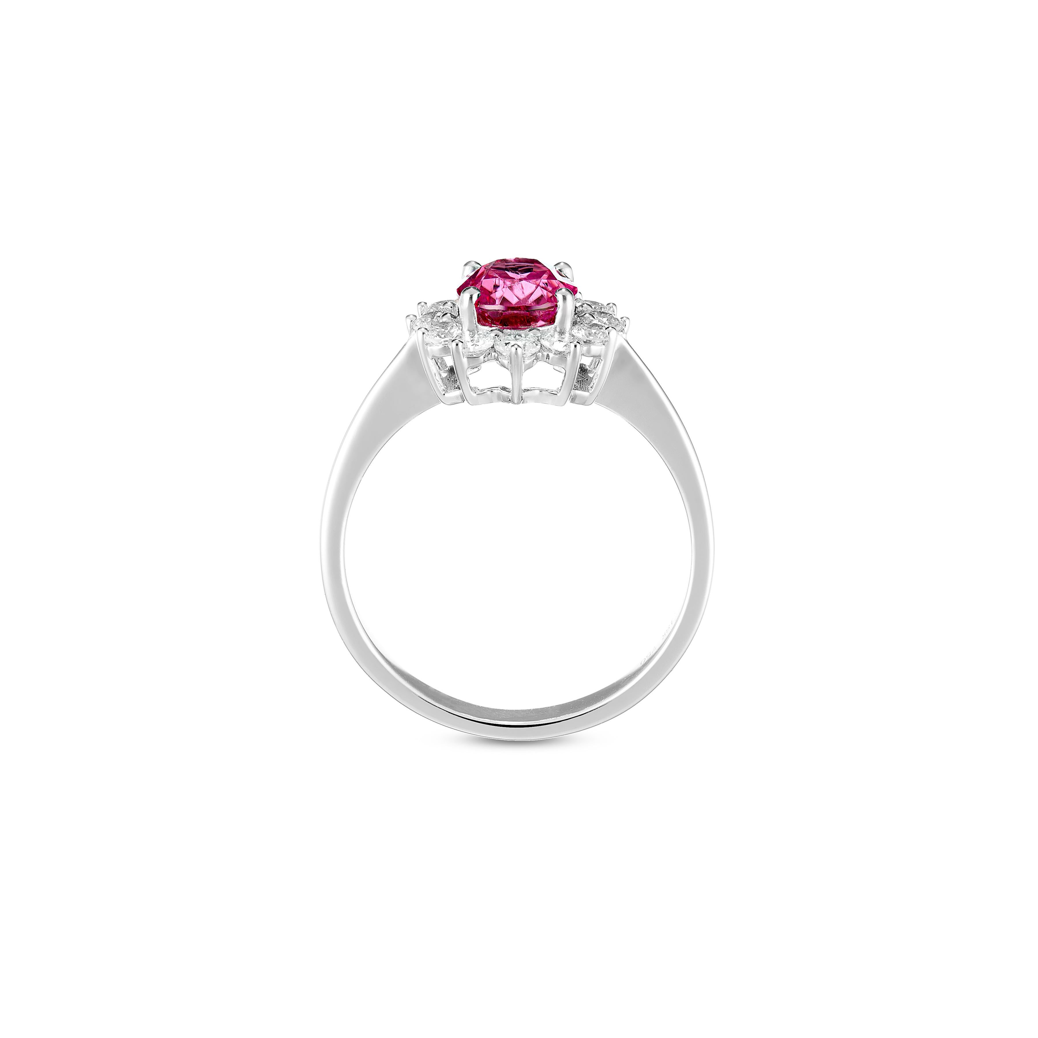 Rare natural African Tourmaline ring handcrafted in 18ct white gold .
Rubellite is the red or pink variety of Tourmaline and is a member of elbaite. Rubellite is also the rarest gem in its gem family. It is occasionally mistaken for ruby.
 It is