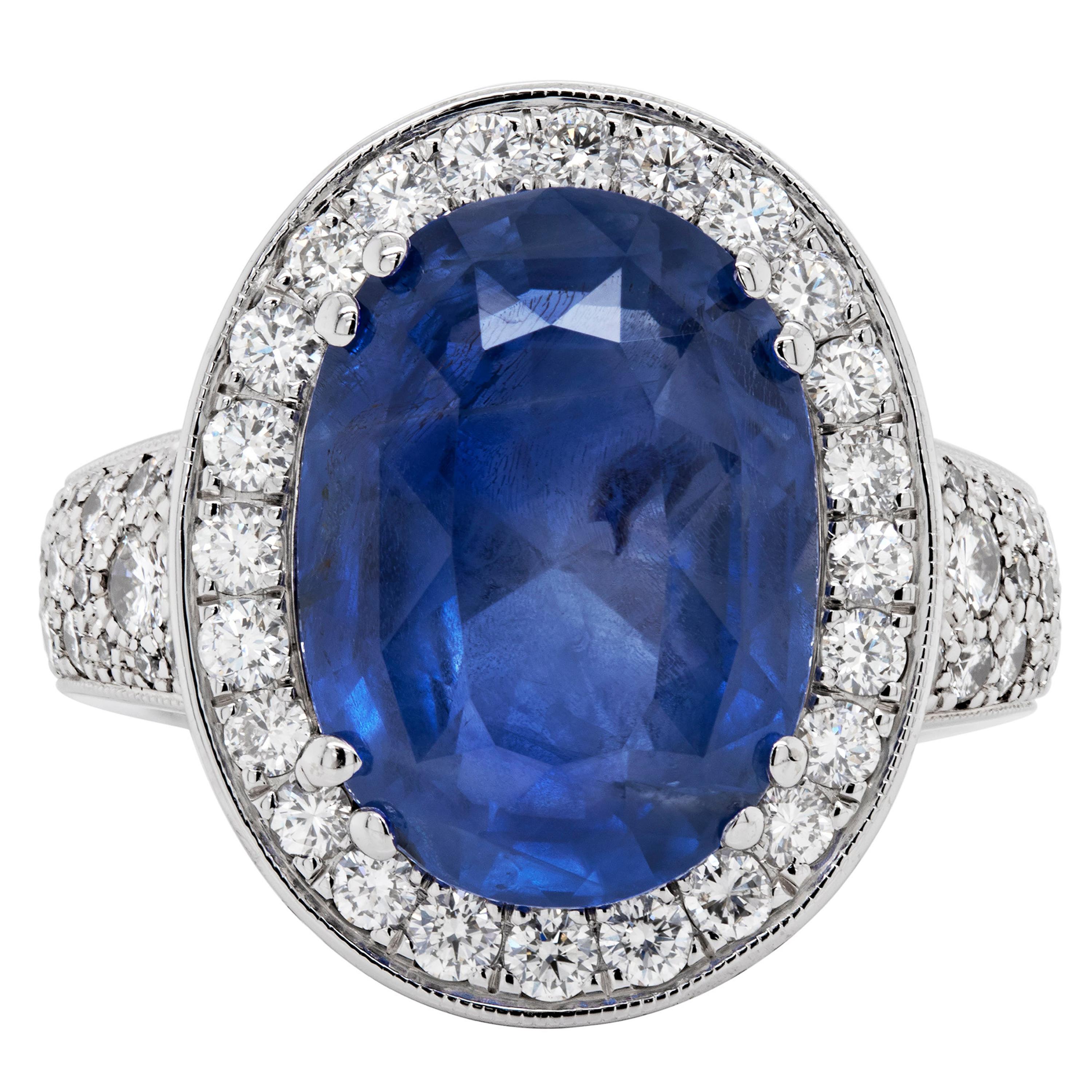12.59 Carat Natural Unheated Oval Blue Sapphire and Diamond 18 Carat Gold Ring For Sale