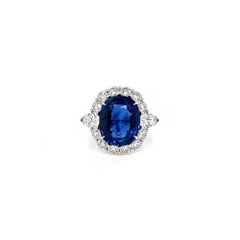 12.59 Total Carat Sapphire and Diamond Halo Vintage Style Ladies Engagement Ring