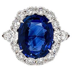12.59 Total Carat Sapphire and Diamond Halo Vintage Style Ladies Engagement Ring