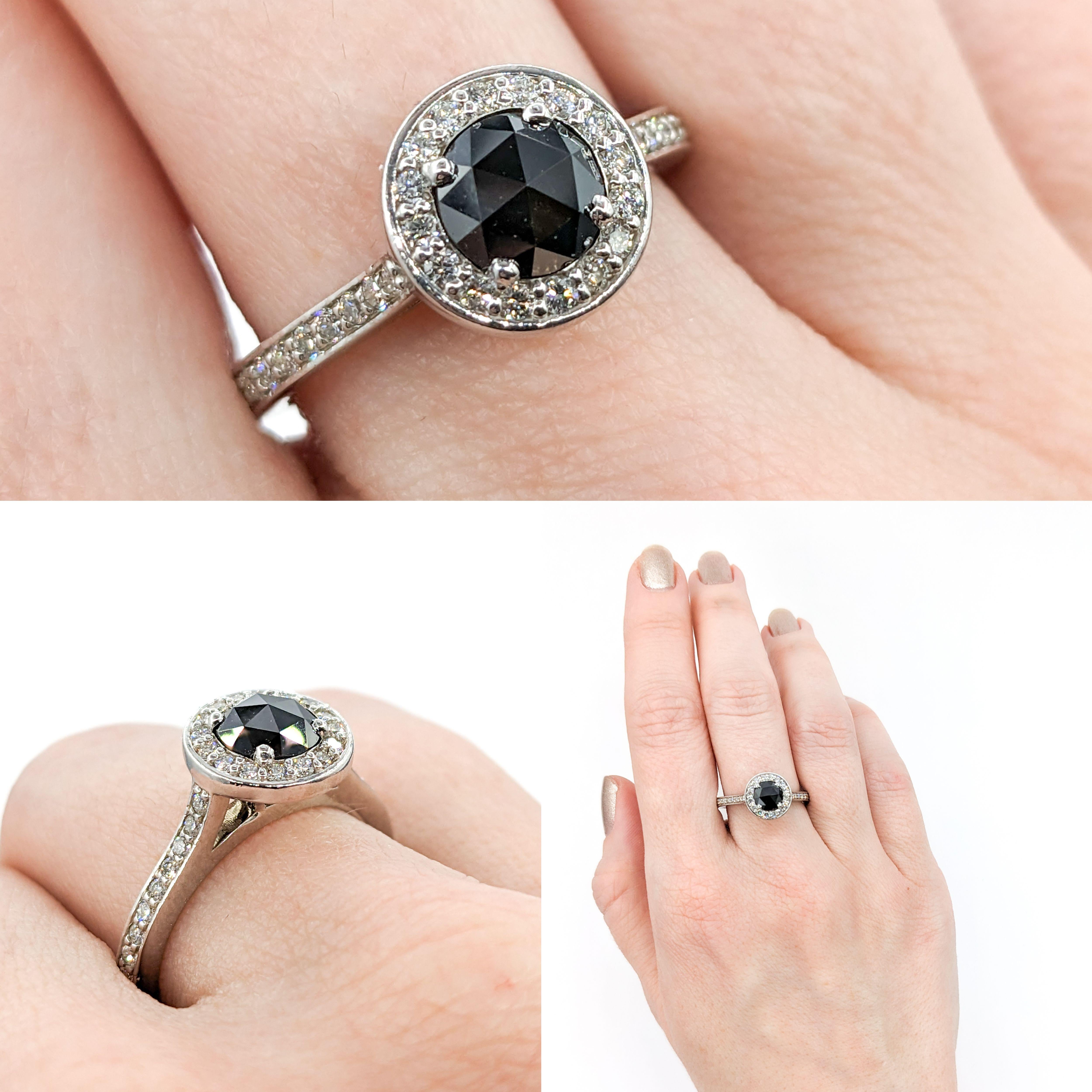 1.25ct Black & White Diamond Ring In White Gold

Presenting a stunning ring, exquisitely set in 14kt white gold, this piece is highlighted by a captivating 1.25 carat round black diamond. The lustrous diamond offers a bold statement with its deep