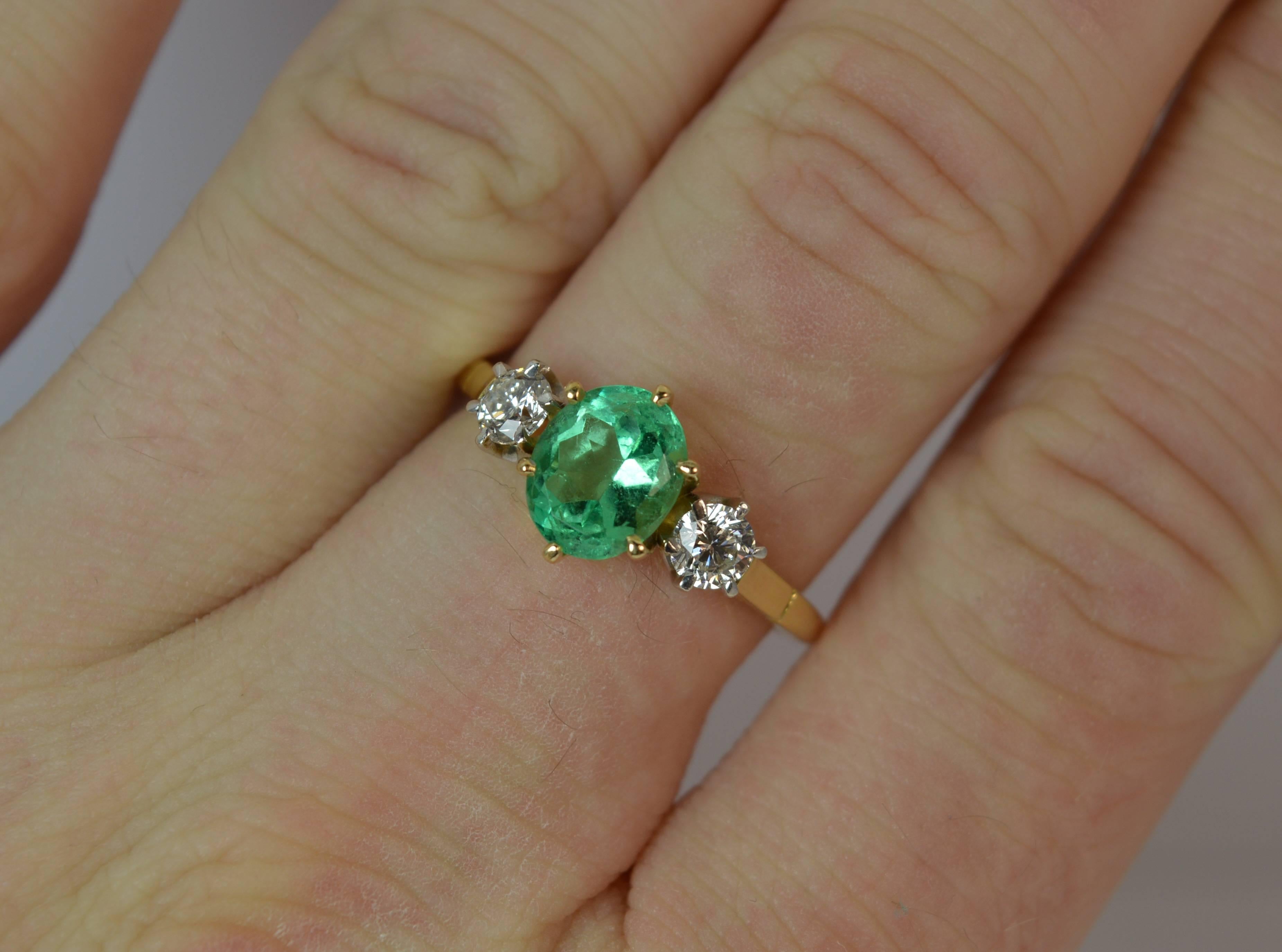 
An absolutely fantastic Emerald and Diamond trilogy ring.

​Designed with a beautiful oval cut natural emerald to the centre, 4.5mm x 6.5mm approx. Set with a natural round brilliant cut diamond to each side. 3.7mm diameter each. VS clarity, clean