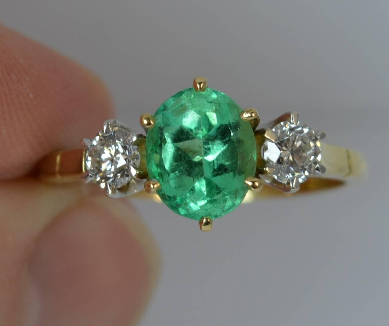 Oval Cut 1.25 Carat Columbian Emerald and VS Diamond 18 Carat Gold Trilogy Ring