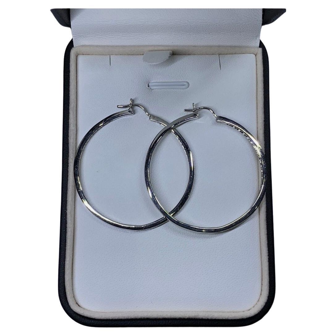 1.25ct Diamond chunky hoop huggies earrings in 18ct white gold For Sale