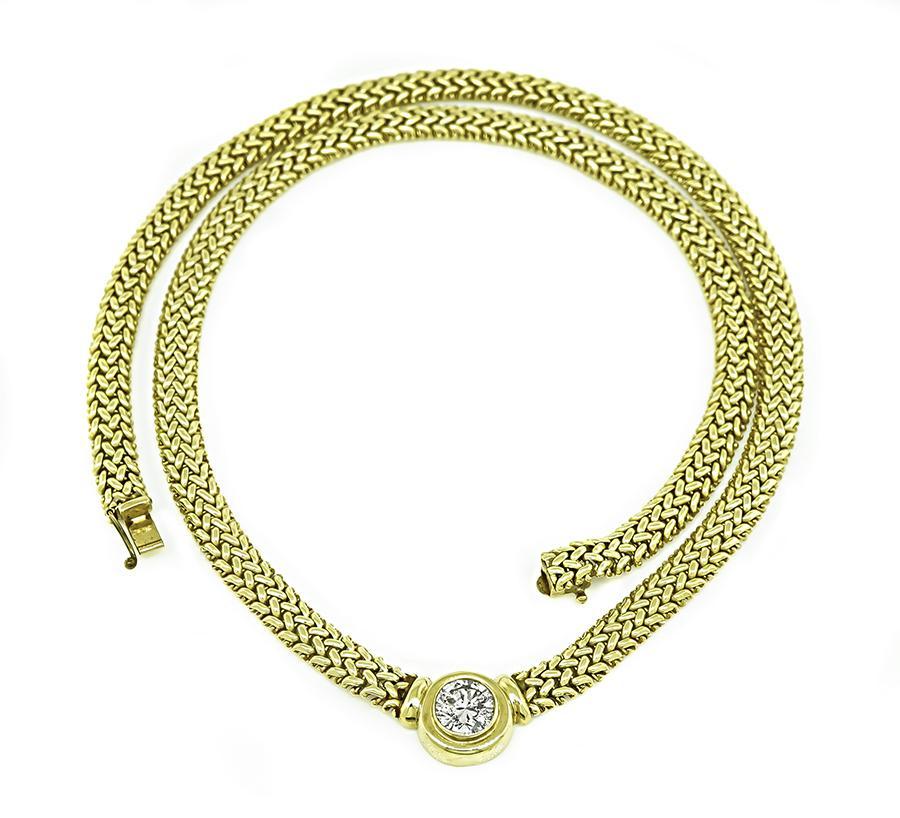 Questa è una splendida collana in oro giallo 14k. La collana è incastonata con scintillanti diamanti a taglio rotondo che pesano circa 1.25 carati. Il colore del diamante è J-K con purezza I1. La collana misura 19 1/4 pollici di lunghezza e pesa 35