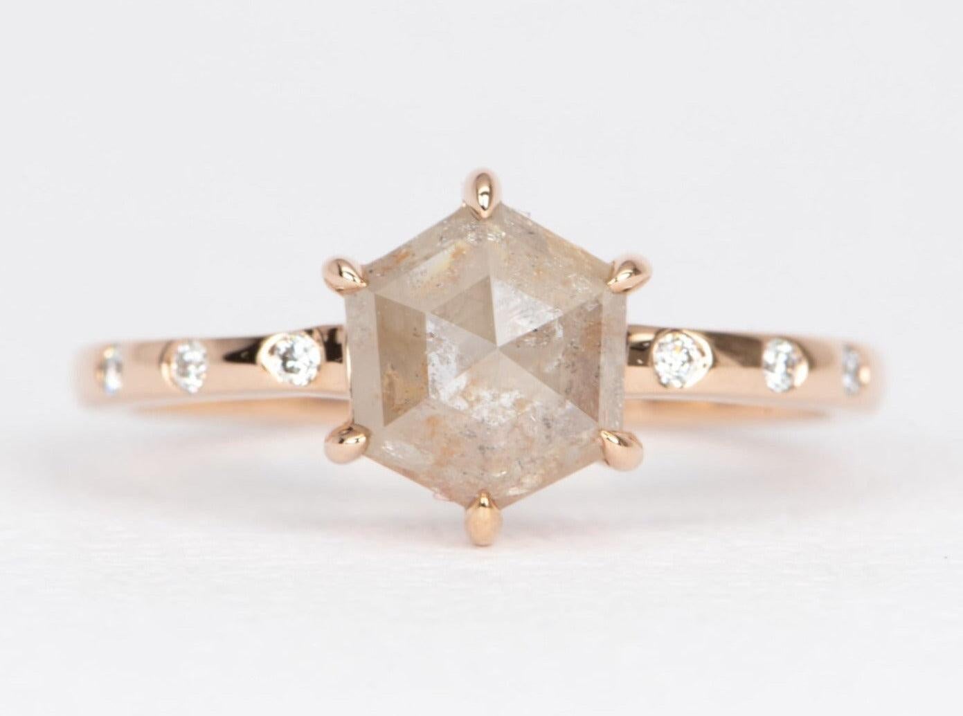 ♥ Solid 14K rose gold ring set with a unique hexagon diamond in the cetner and diamond accents
♥ The setting measures 9.1 mm in length, 8 mm in width, and sits 5.1 mm in height

♥ Ring Size: US Size 7 (Free re-sizing up or down one size)
♥ Band