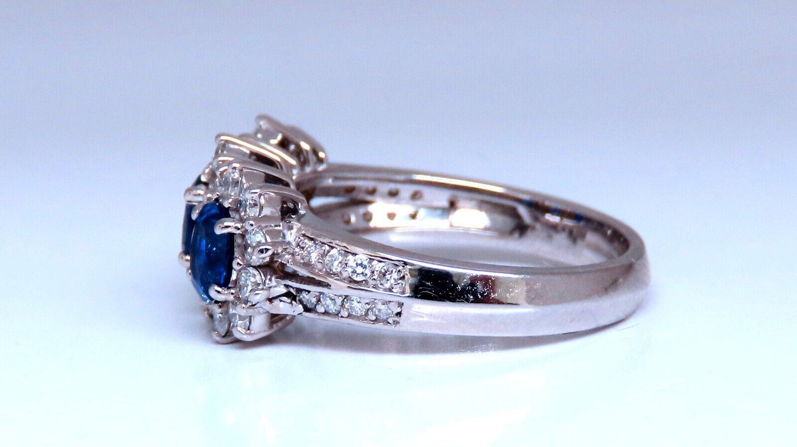 Classic Diamond & Sapphires 3 Cluster ring 

1.25ct Sapphires (Heated)

Oval Full Cut Brilliant

.70ct natural diamonds 

G-color Vs-2 Clarity

9.2mm diameter

Depth of ring: 5.4mm

current ring size:  6.25

& 

We May Resize.

Please inquire.

14Kt