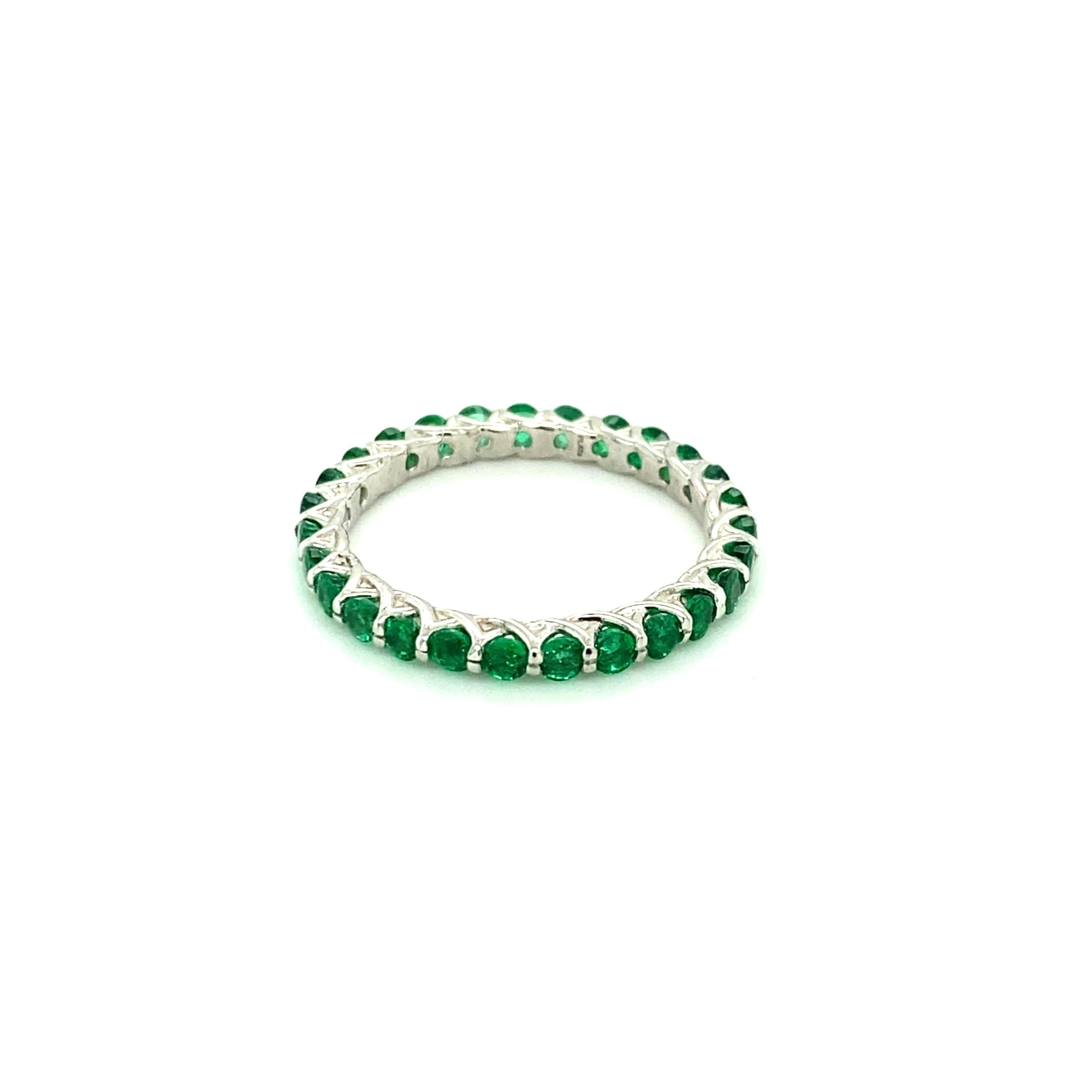 Round Cut 1.25 Carat Round Brilliant Emerald Eternity Band Set in Platinum For Sale