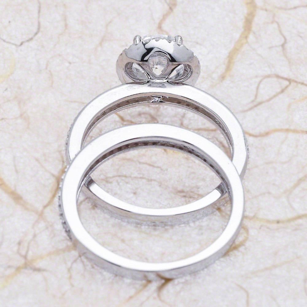 Modern 1.25ct Round Cut Moissanite Bridal Ring Set in 14K White Gold For Sale