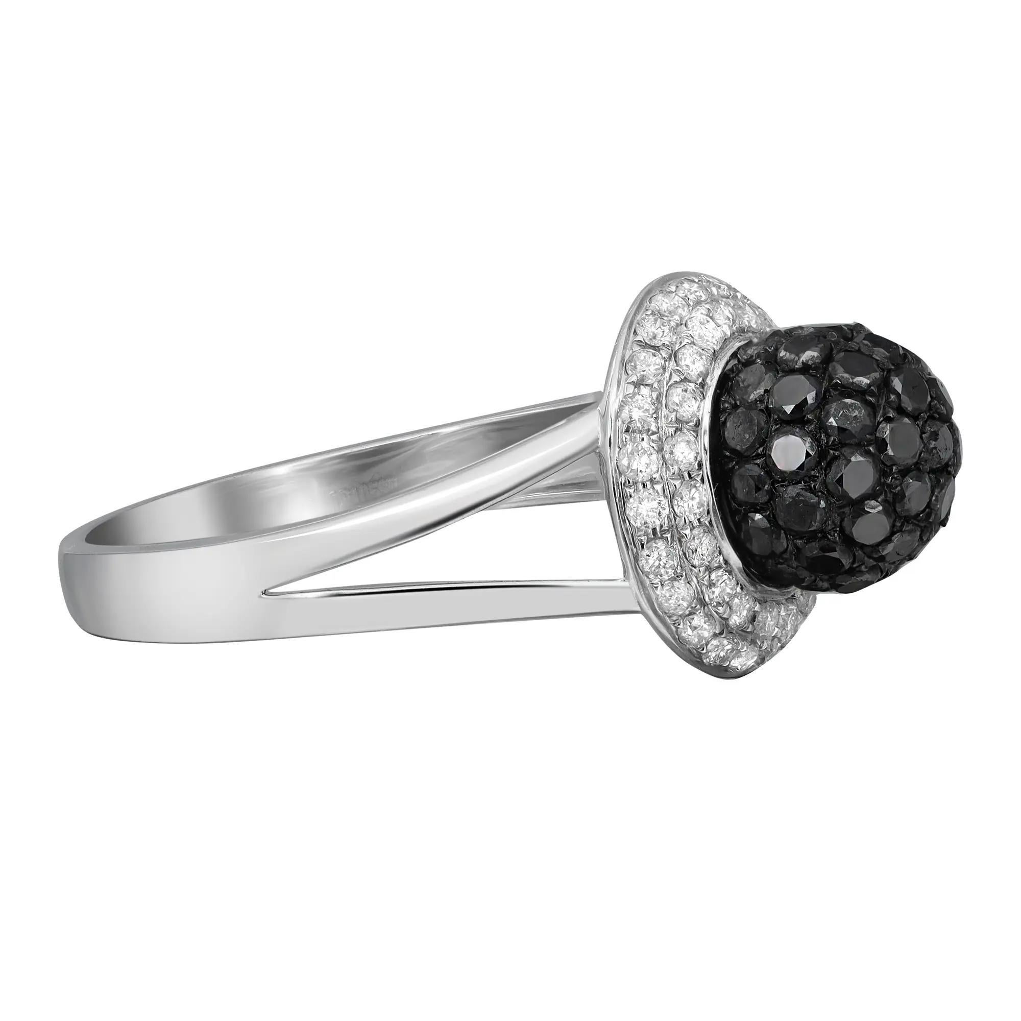 This beautiful diamond cocktail ring is crafted in fine 14k white gold. An excellent pave set of black round brilliant cut diamonds are flanked as a center round ball surrounded with white round cut diamonds. Total diamond weight: 1.25 carats.