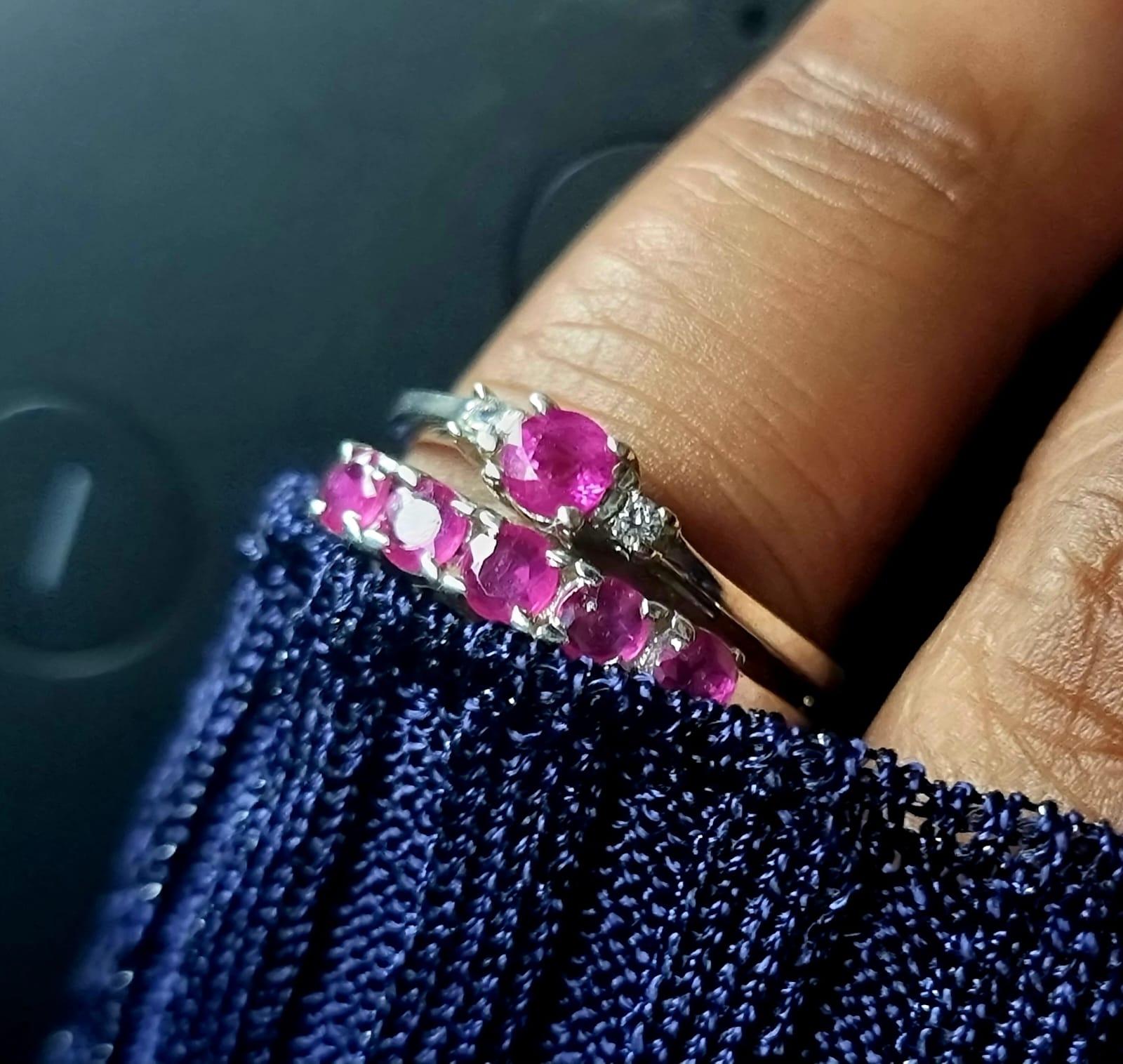 Introducing our 1.25CTW Round Pink Sapphire Platinum Silver Band Ring, a stunning piece that exudes elegance and sophistication. This ring features a mesmerizing 5X .25ct Round Pink Sapphire at its center, known for its captivating pink hue and