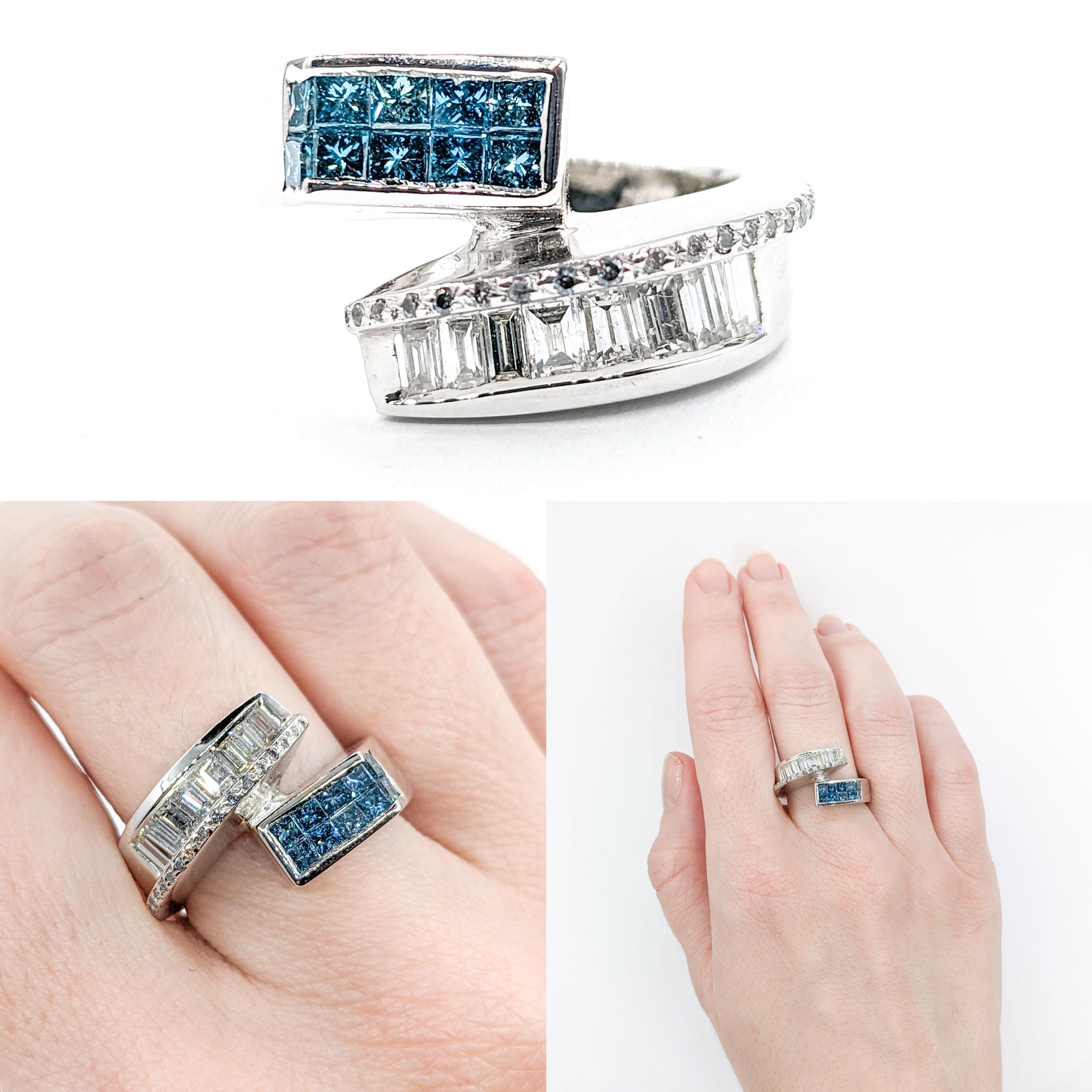 1.25ctw White Diamonds & Blue Diamonds In White Gold 

Showcase sophistication with this gorgeous ring, crafted in 14kt white gold and adorned with 1.25ctw of both princess and baguette diamonds. These sparkling gems boast SI1-SI2 clarity and come