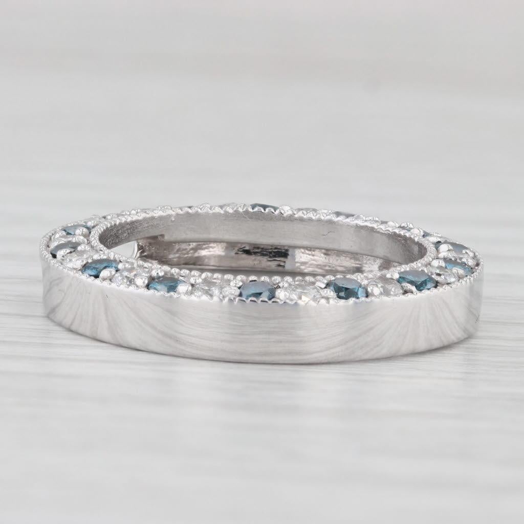 Gemstone Information:
- Natural Diamonds -
Total Carats - 0.60ctw
Cut - Round Brilliant
Color - F - H
Clarity - SI2 - I1

- Natural Diamonds -
Total Carats - 0.65ctw
Cut - Round Brilliant
Color - Treated Blue / Teal
Clarity - SI2 - I2
Treated -
