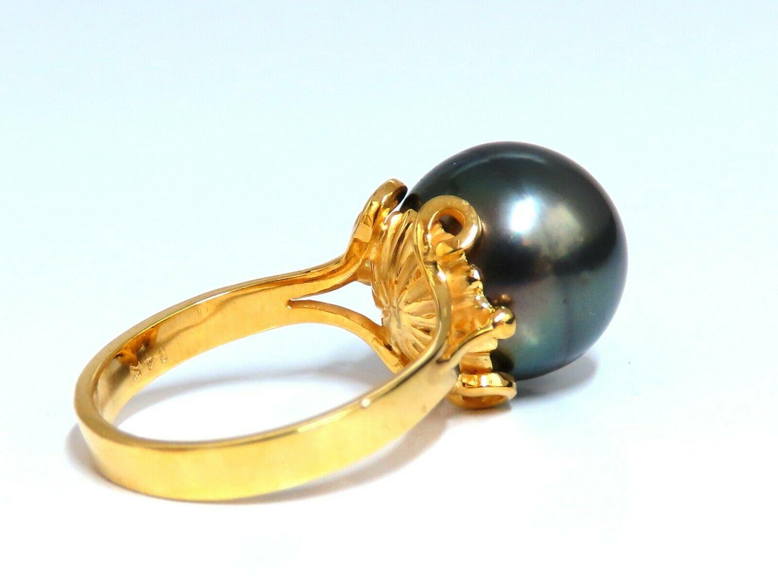 Black Tahitian Within Petals

12.5mm natural Tahitian Peacock pearl ring

  Green Overtone, Fine luster.

14kt. yellow gold

5.6 grams.

Current ring size: 6

Depth of ring: 13.4mm

We may resize, Slightly.