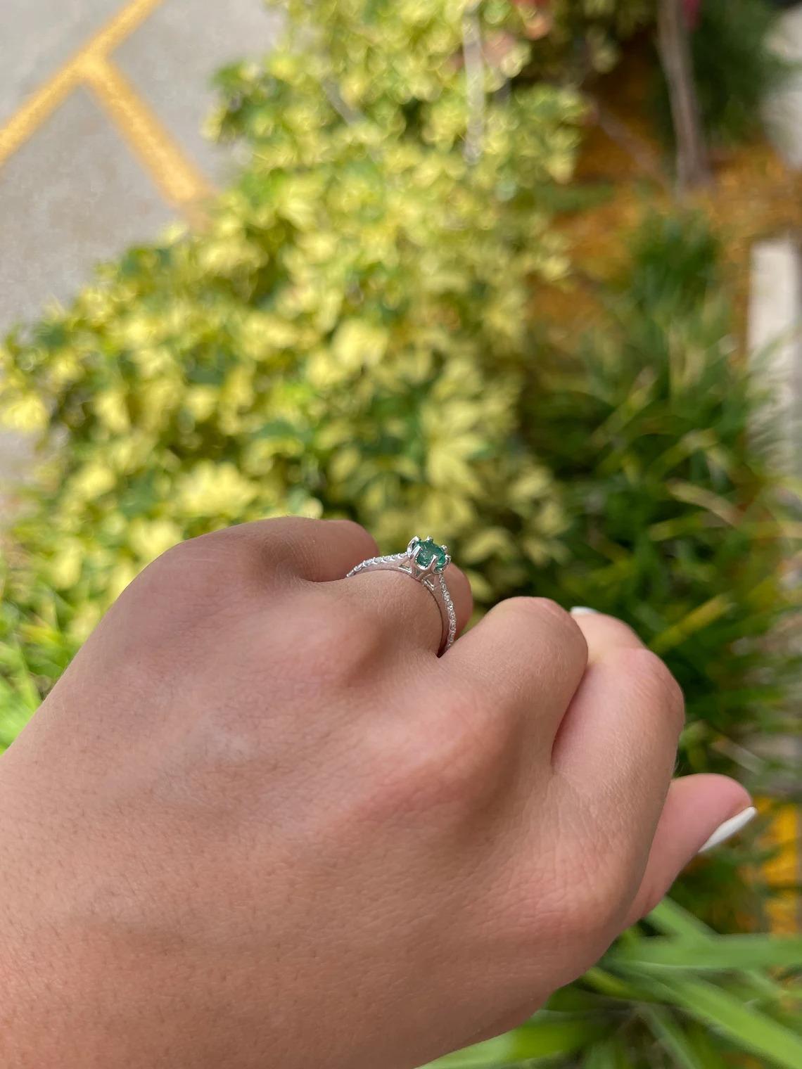 1.25tcw 14K Natural Emerald-Round Cut & Diamond Shank White Gold Engagement Ring In New Condition For Sale In Jupiter, FL