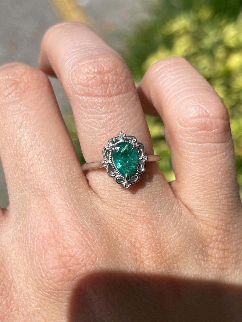 Modern 1.25tcw Platinum Pear Cut Emerald & Diamond Ring - Rich Green Floral Setting 950 For Sale