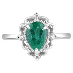 Bague en platine avec émeraude taille poire et diamants de 1,25 carat - sertissage floral vert riche 950