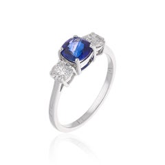 Bague promesse en or blanc 18 carats avec saphir bleu de 1,26 carat et diamants de 0,75 carat SI/H