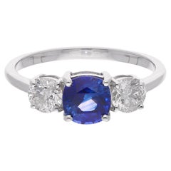 Anello Promessa con Zaffiro Blu da 1,26 carati e Diamante SI/H da 0,75 carati in oro bianco 18 carati