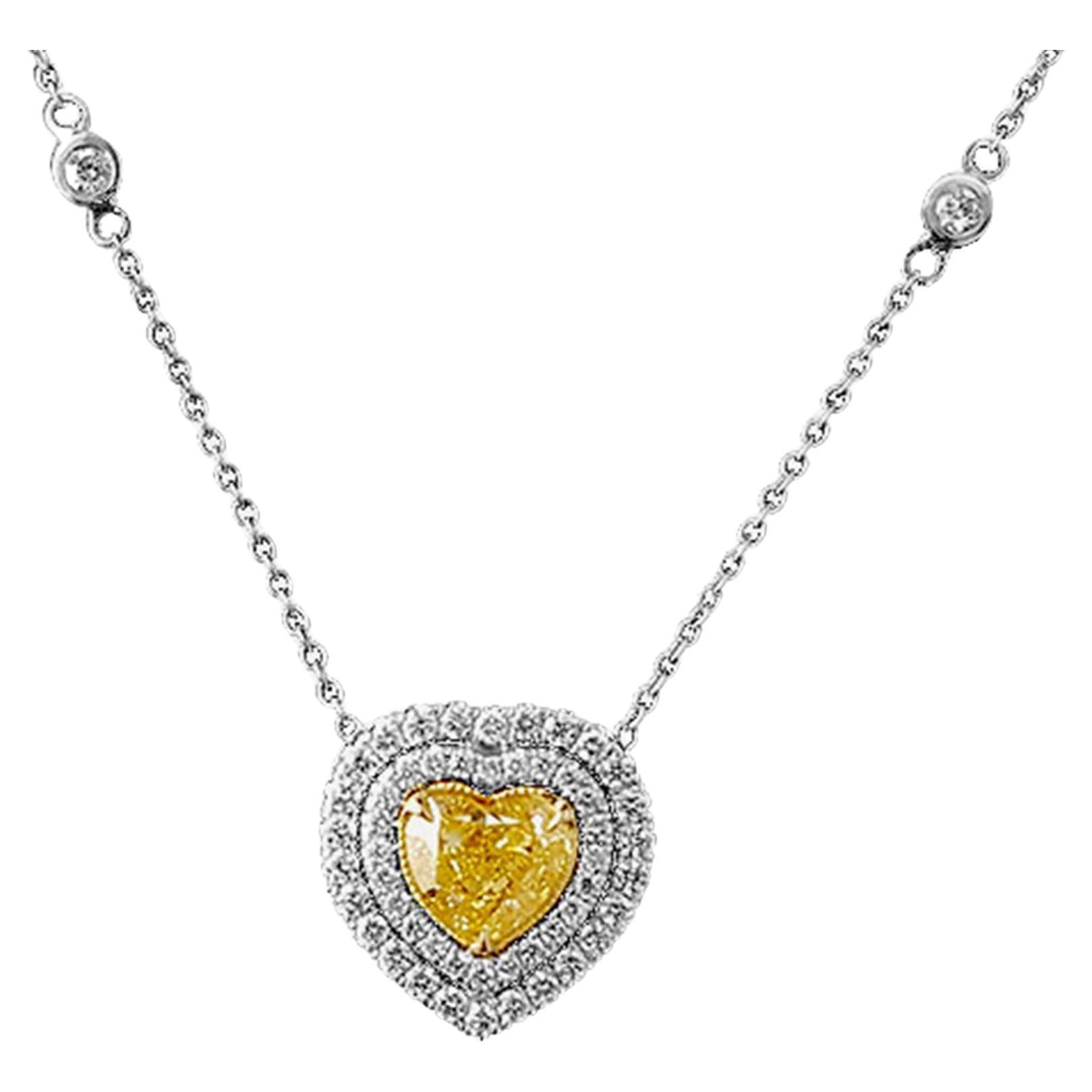 1.26 Carat Heart Cut, Fancy Yellow Diamond Halo Pendant Necklace, 18K Gold, GIA. For Sale