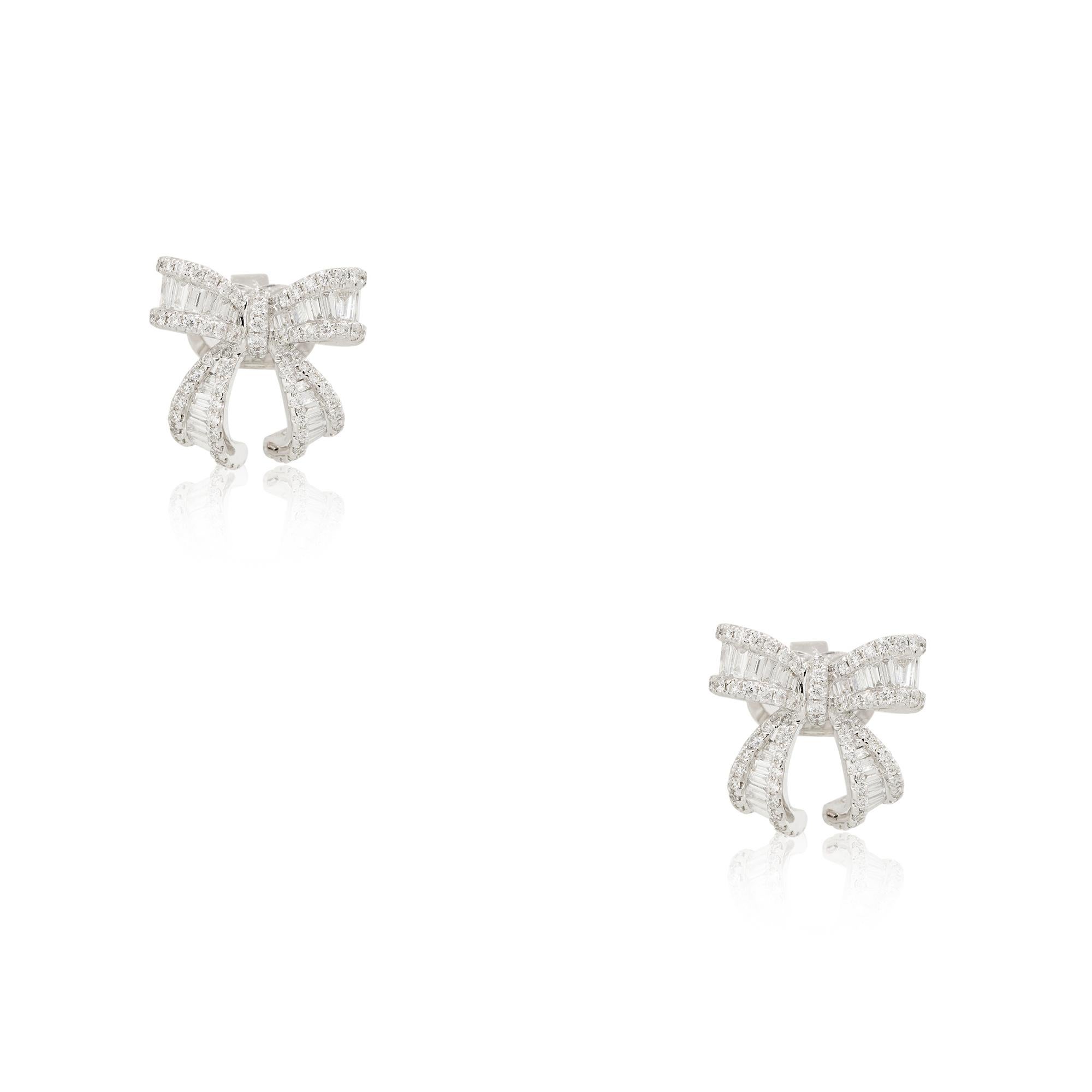 18k White Gold 1.26ctw Mosaic Diamond Bow Shaped Earrings
Product: Square Diamond Mosaic Earrings
Material: 18k White Gold
Diamond Details: There are approximately 0.70 carats of Baguette cut diamonds (63 stones) and approximately 0.56 carats of