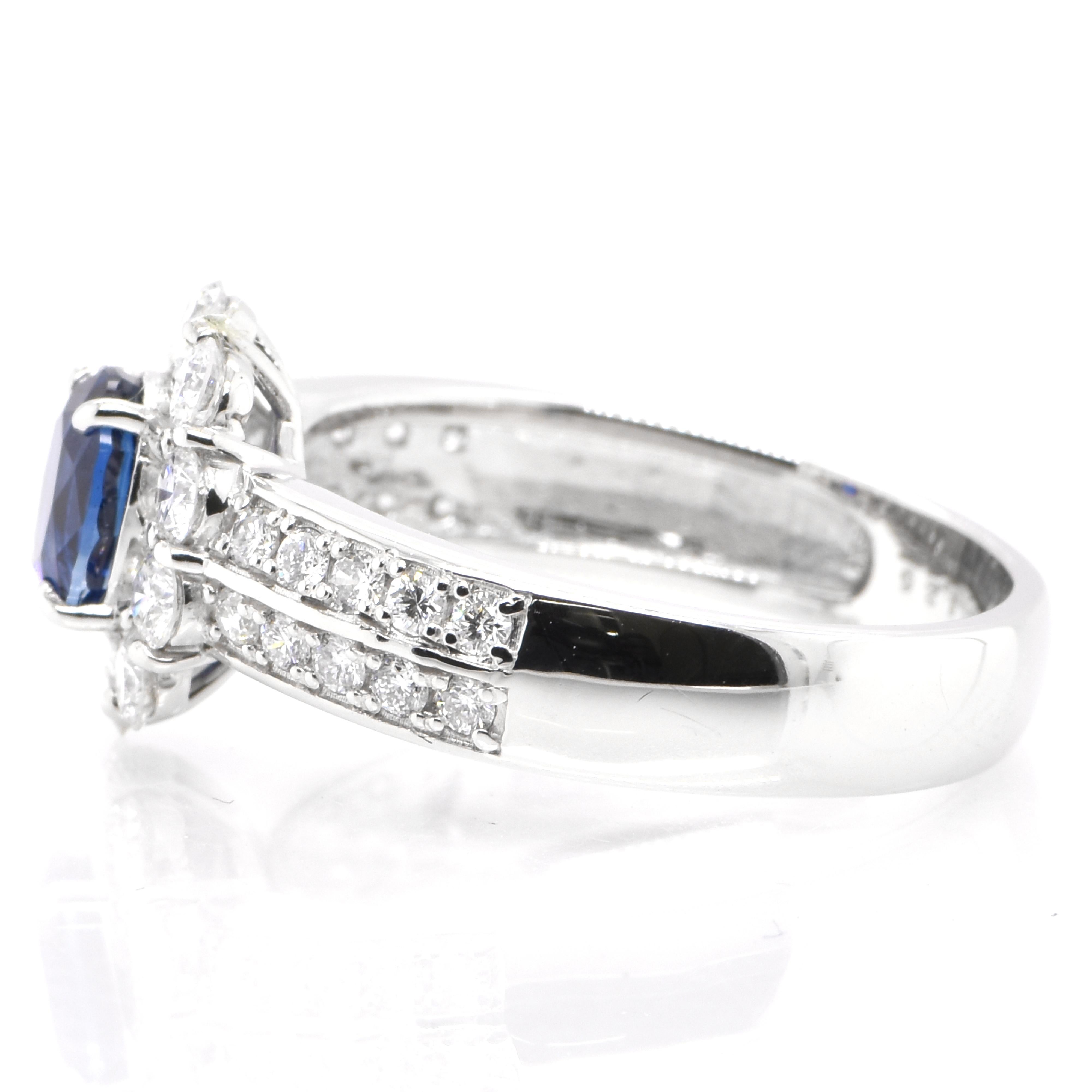 Oval Cut 1.26 Carat Natural Blue Sapphire and Diamond Halo Ring Set in Platinum For Sale