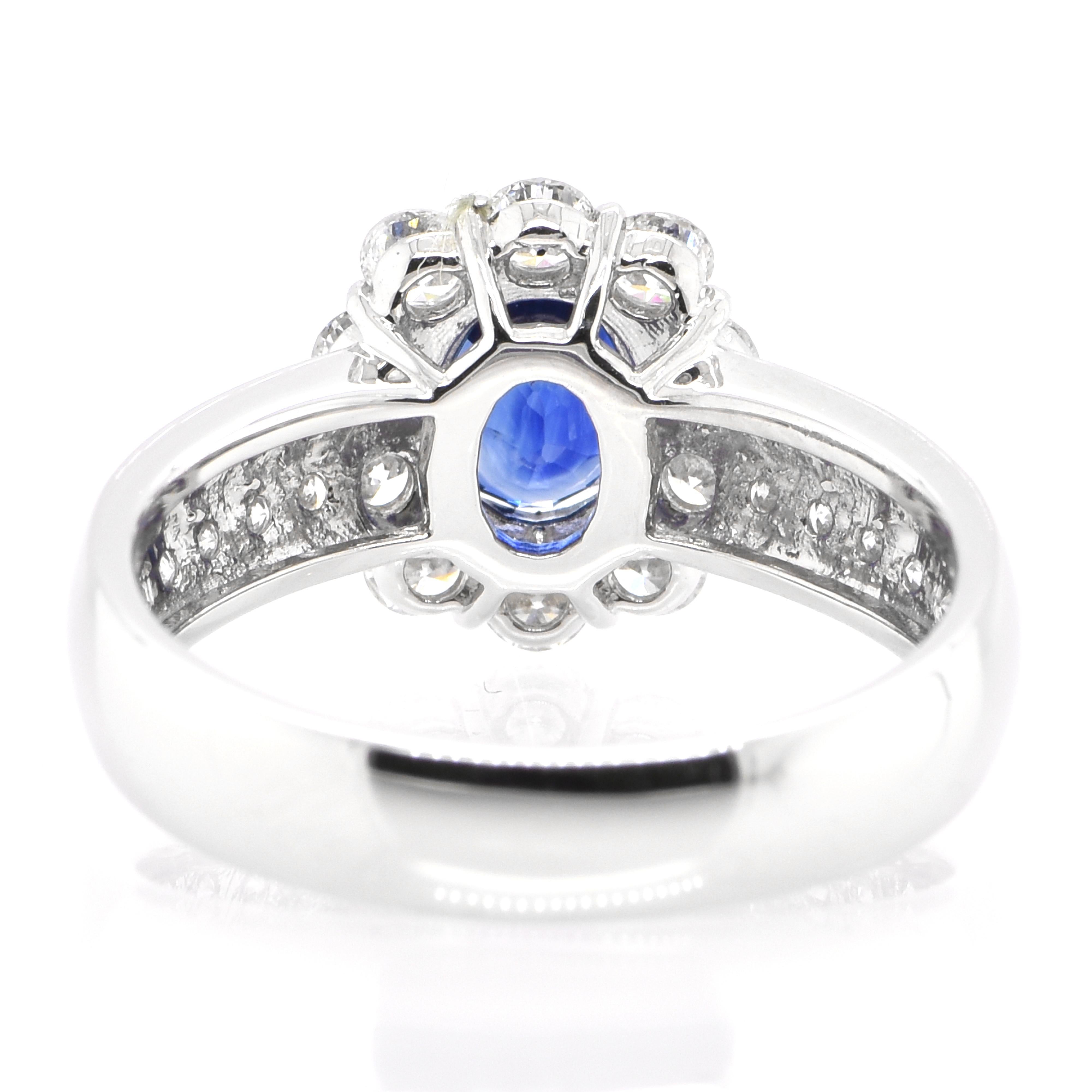 Women's 1.26 Carat Natural Blue Sapphire and Diamond Halo Ring Set in Platinum For Sale