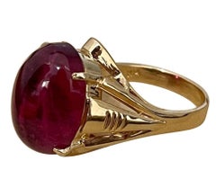 12.6 Carat Oval Cut Cabochon Pink Tourmaline 14 Karat Yellow Gold Ring